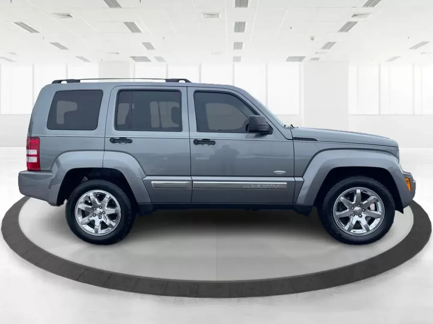 2012 Jeep Liberty Sport 4WD (1C4PJMAK8CW) with an 3.7L V6 SOHC 12V engine, 4-Speed Automatic transmission, located at 1099 N County Rd 25A, Troy, OH, 45373, (937) 908-9800, 40.057079, -84.212883 - 2012 Jeep Liberty Sport 4WD - Photo#1