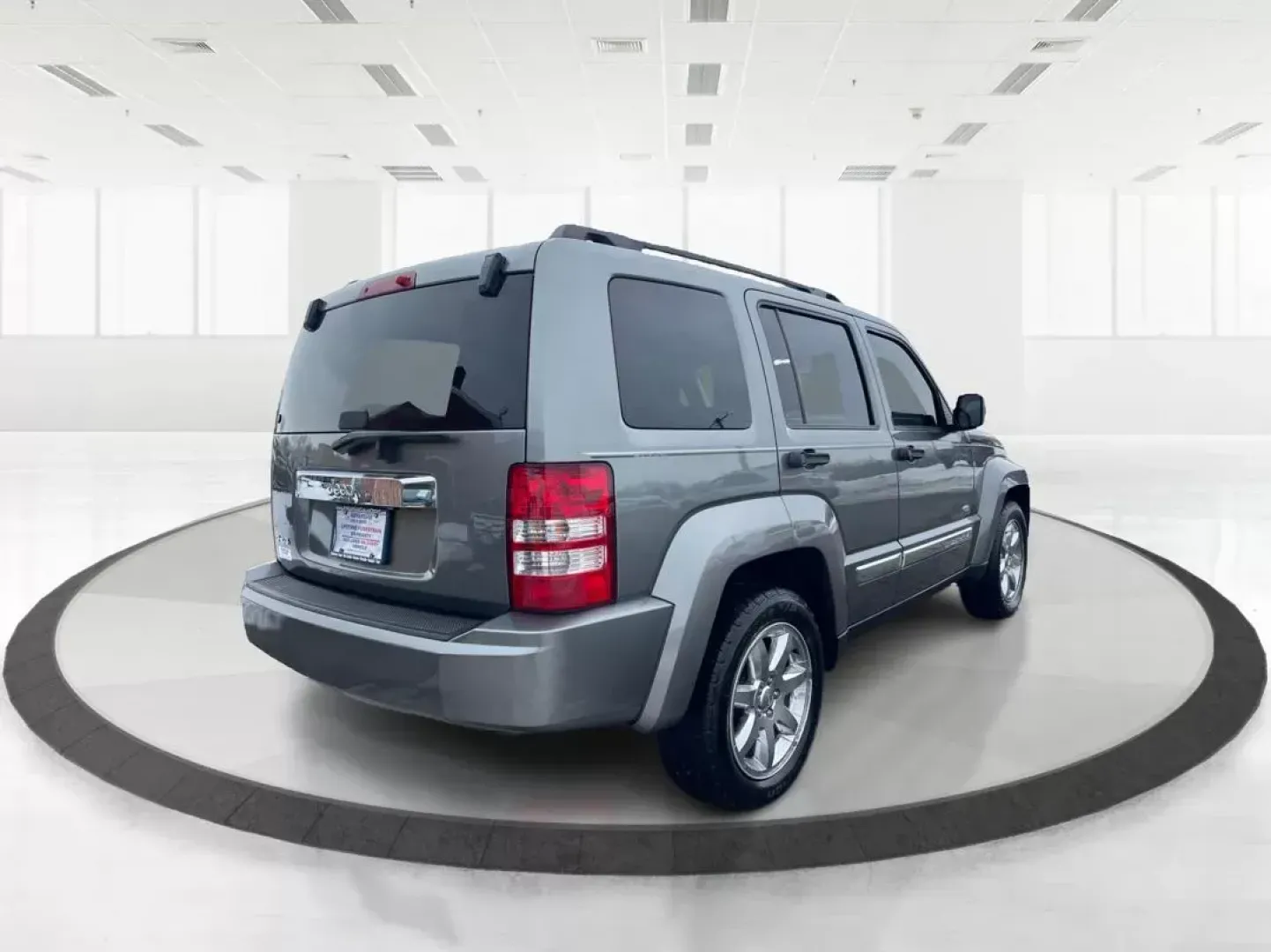 2012 Jeep Liberty Sport 4WD (1C4PJMAK8CW) with an 3.7L V6 SOHC 12V engine, 4-Speed Automatic transmission, located at 1099 N County Rd 25A, Troy, OH, 45373, (937) 908-9800, 40.057079, -84.212883 - 2012 Jeep Liberty Sport 4WD - Photo#2