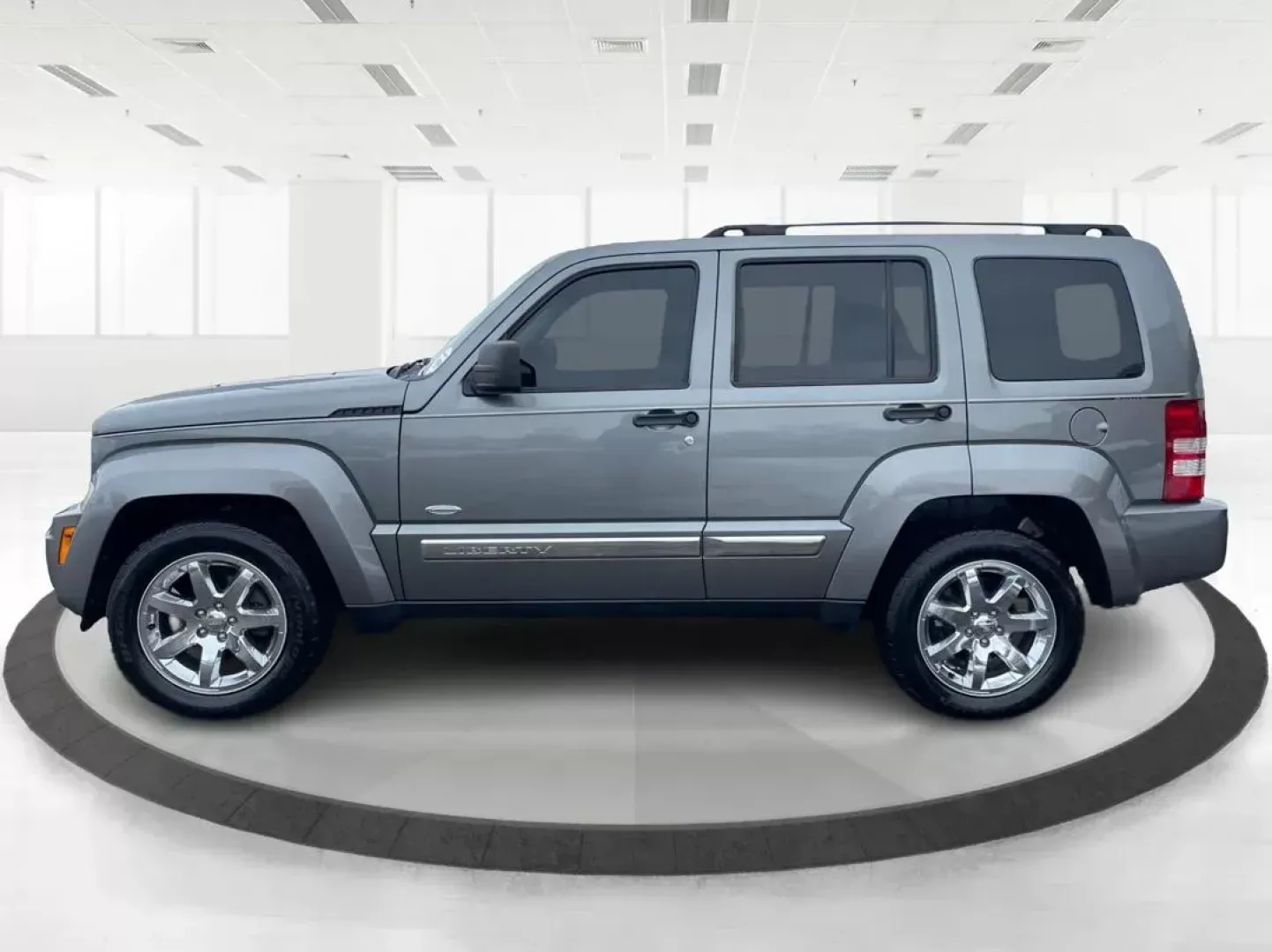 2012 Jeep Liberty Sport 4WD (1C4PJMAK8CW) with an 3.7L V6 SOHC 12V engine, 4-Speed Automatic transmission, located at 1099 N County Rd 25A, Troy, OH, 45373, (937) 908-9800, 40.057079, -84.212883 - 2012 Jeep Liberty Sport 4WD - Photo#6