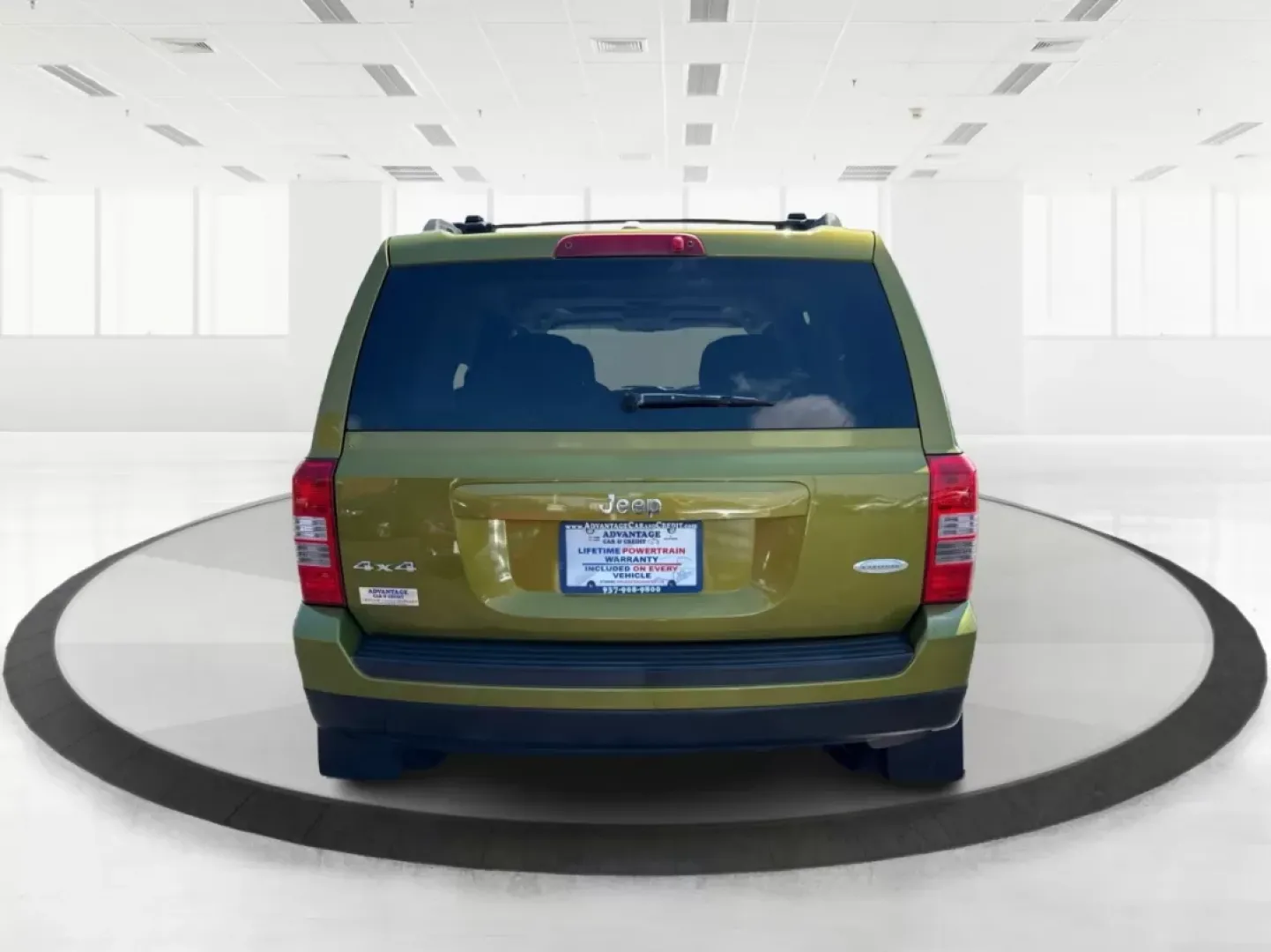 2012 Rescue Green Metallic Jeep Patriot Latitude 4WD (1C4NJRFB8CD) with an 2.4L L4 DOHC 16V engine, located at 1951 S Dayton Lakeview Rd., New Carlisle, OH, 45344, (937) 908-9800, 39.890999, -84.050255 - **Discover Your Next Adventure with the 2012 Jeep Patriot Latitude 4WD at Advantage Car and Credit!**<br /> <br /> Are you ready to elevate your weekend getaways and everyday commutes? The 2012 Jeep Patriot Latitude 4WD is the perfect companion for those who crave adventure and seek comfort in their - Photo#3