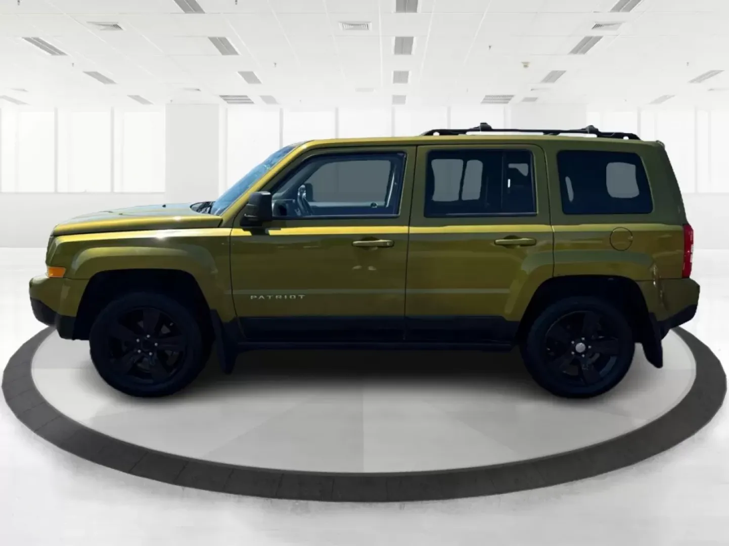 2012 Rescue Green Metallic Jeep Patriot Latitude 4WD (1C4NJRFB8CD) with an 2.4L L4 DOHC 16V engine, located at 1951 S Dayton Lakeview Rd., New Carlisle, OH, 45344, (937) 908-9800, 39.890999, -84.050255 - **Discover Your Next Adventure with the 2012 Jeep Patriot Latitude 4WD at Advantage Car and Credit!**<br /> <br /> Are you ready to elevate your weekend getaways and everyday commutes? The 2012 Jeep Patriot Latitude 4WD is the perfect companion for those who crave adventure and seek comfort in their - Photo#5
