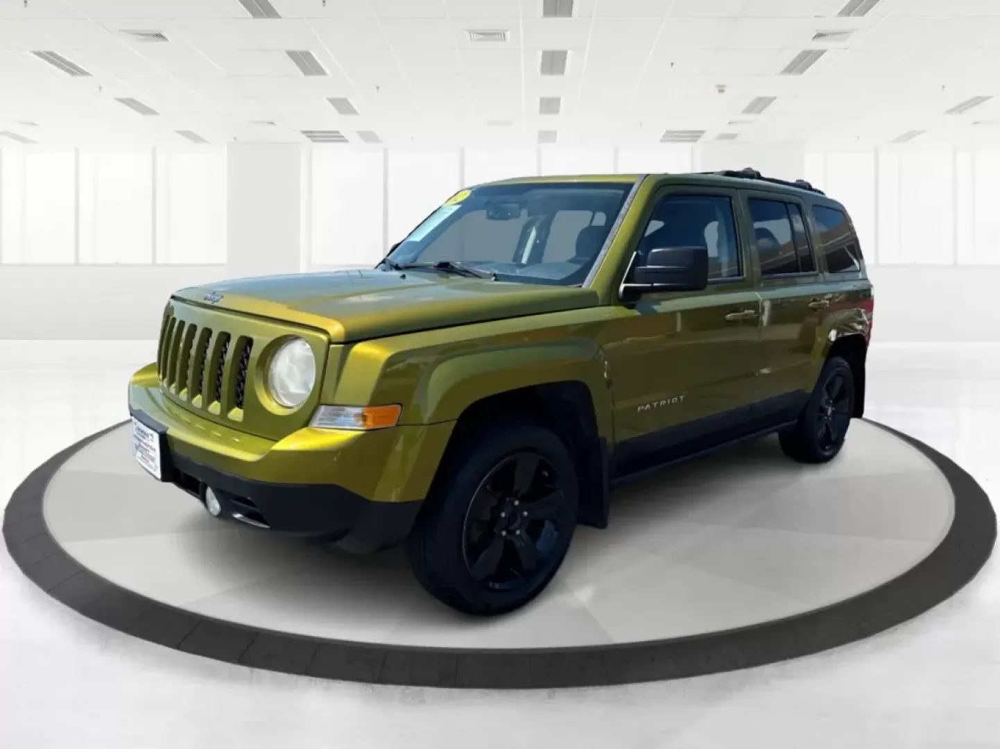 2012 Rescue Green Metallic Jeep Patriot Latitude 4WD (1C4NJRFB8CD) with an 2.4L L4 DOHC 16V engine, located at 1951 S Dayton Lakeview Rd., New Carlisle, OH, 45344, (937) 908-9800, 39.890999, -84.050255 - **Discover Your Next Adventure with the 2012 Jeep Patriot Latitude 4WD at Advantage Car and Credit!**<br /> <br /> Are you ready to elevate your weekend getaways and everyday commutes? The 2012 Jeep Patriot Latitude 4WD is the perfect companion for those who crave adventure and seek comfort in their - Photo#8