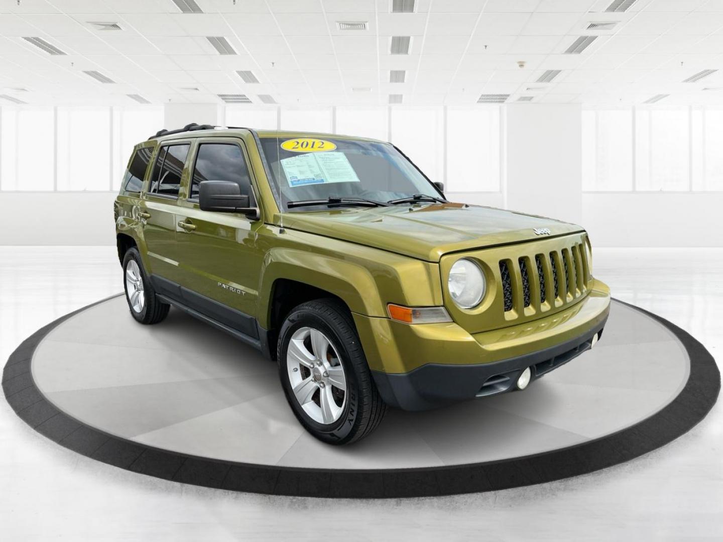 2012 Jeep Patriot Latitude 2WD (1C4NJPFA7CD) with an 2.0L L4 DOHC 16V engine, located at 401 Woodman Dr, Riverside, OH, 45431, (937) 908-9800, 39.760899, -84.123421 - 2012 Jeep Patriot Latitude 2WD - Photo#0