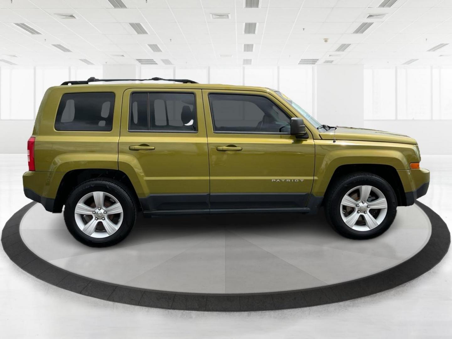 2012 Jeep Patriot Latitude 2WD (1C4NJPFA7CD) with an 2.0L L4 DOHC 16V engine, located at 401 Woodman Dr, Riverside, OH, 45431, (937) 908-9800, 39.760899, -84.123421 - 2012 Jeep Patriot Latitude 2WD - Photo#1