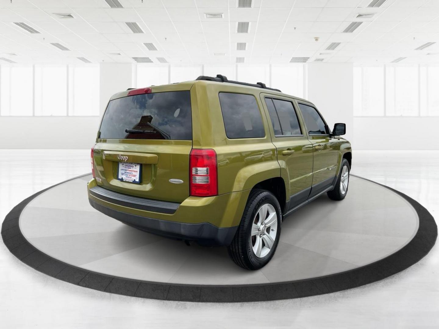 2012 Jeep Patriot Latitude 2WD (1C4NJPFA7CD) with an 2.0L L4 DOHC 16V engine, located at 401 Woodman Dr, Riverside, OH, 45431, (937) 908-9800, 39.760899, -84.123421 - 2012 Jeep Patriot Latitude 2WD - Photo#2