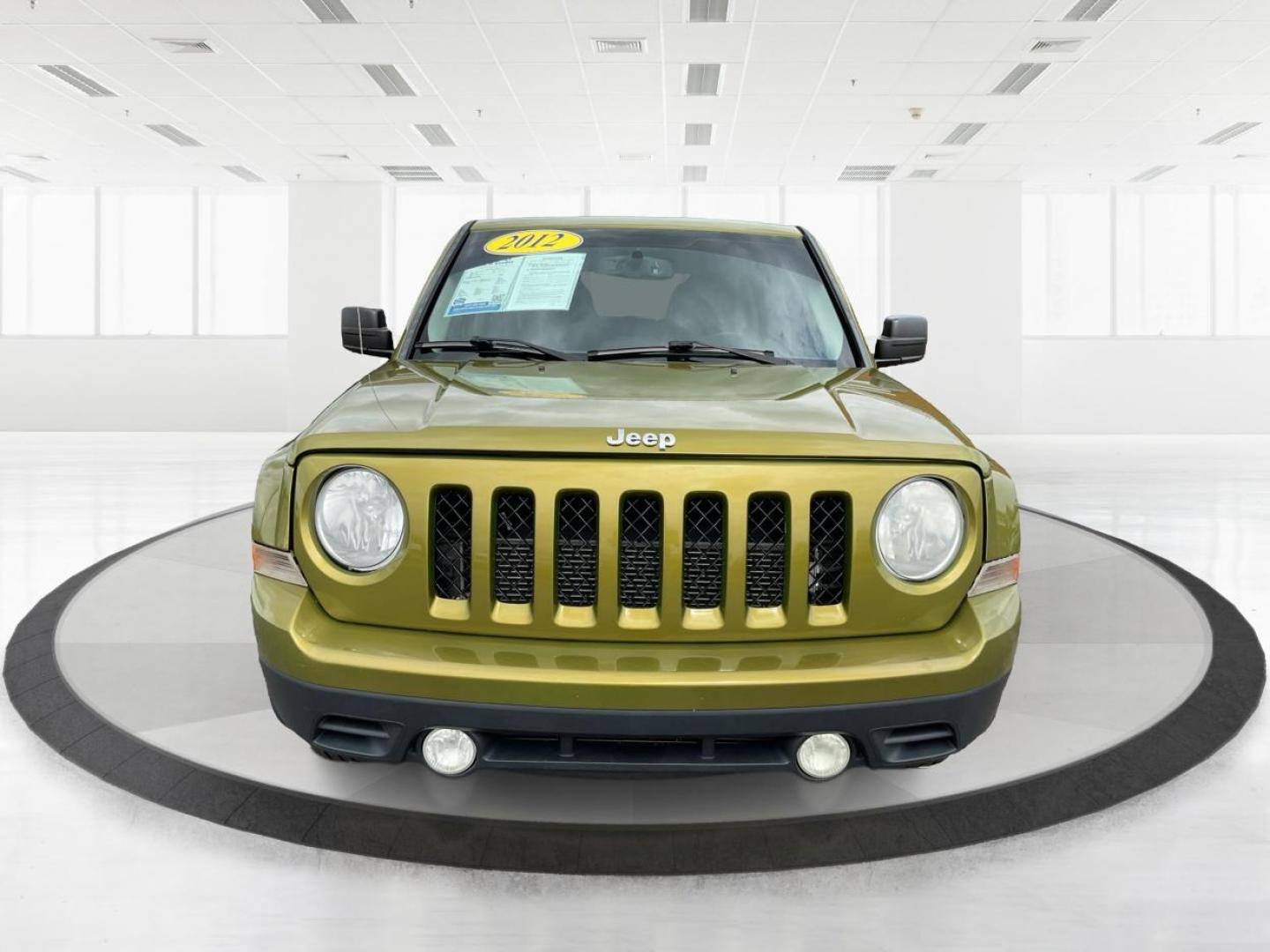 2012 Jeep Patriot Latitude 2WD (1C4NJPFA7CD) with an 2.0L L4 DOHC 16V engine, located at 401 Woodman Dr, Riverside, OH, 45431, (937) 908-9800, 39.760899, -84.123421 - 2012 Jeep Patriot Latitude 2WD - Photo#7