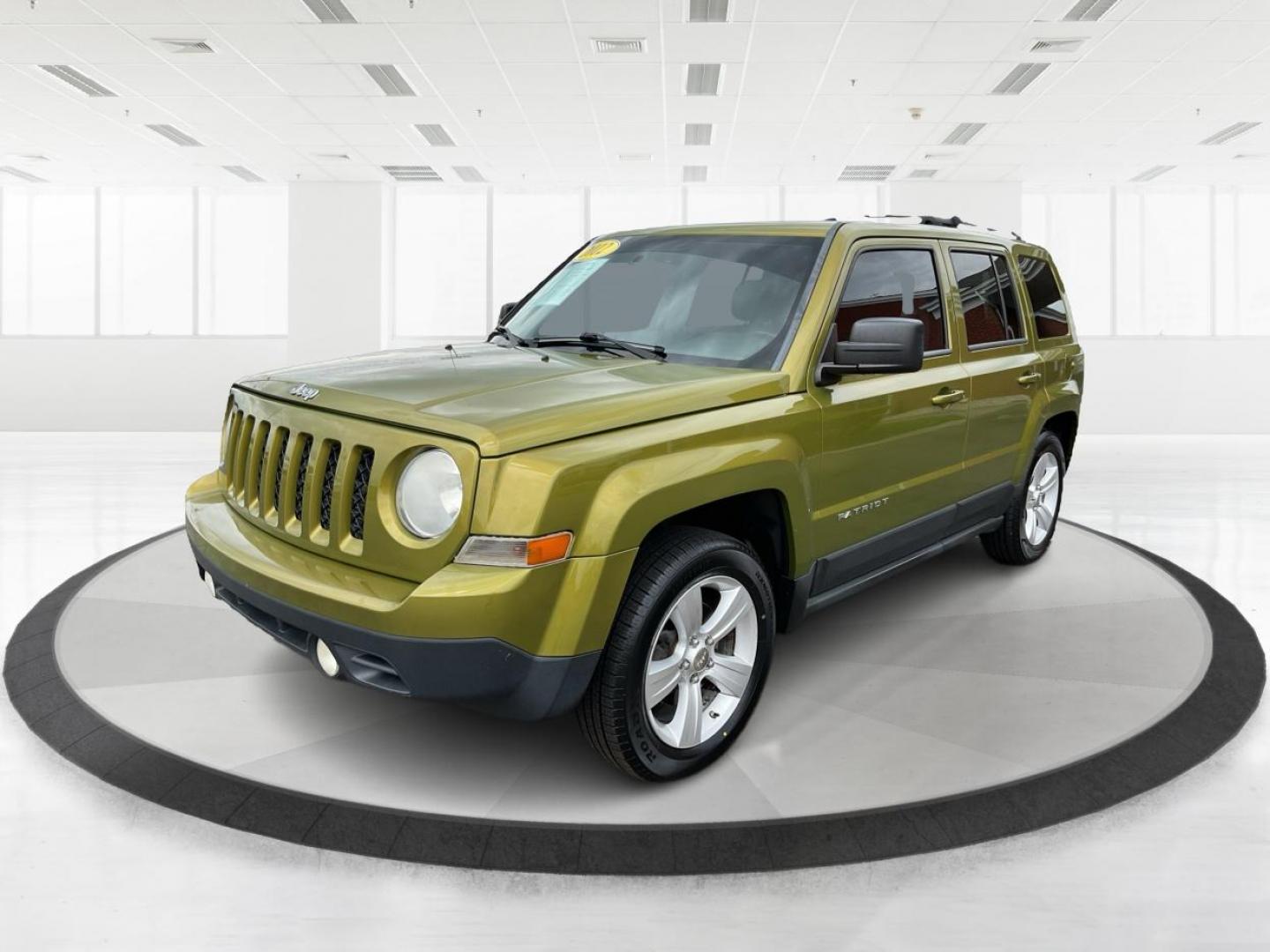 2012 Jeep Patriot Latitude 2WD (1C4NJPFA7CD) with an 2.0L L4 DOHC 16V engine, located at 401 Woodman Dr, Riverside, OH, 45431, (937) 908-9800, 39.760899, -84.123421 - 2012 Jeep Patriot Latitude 2WD - Photo#8