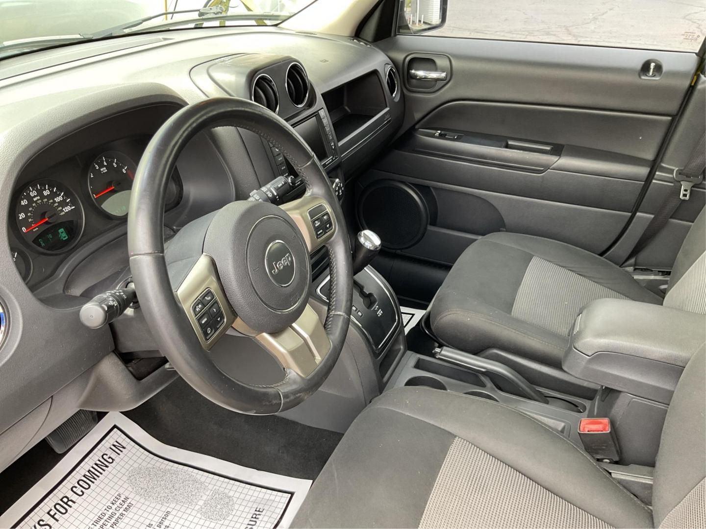 2012 Jeep Patriot Latitude 2WD (1C4NJPFA7CD) with an 2.0L L4 DOHC 16V engine, located at 401 Woodman Dr, Riverside, OH, 45431, (937) 908-9800, 39.760899, -84.123421 - 2012 Jeep Patriot Latitude 2WD - Photo#9