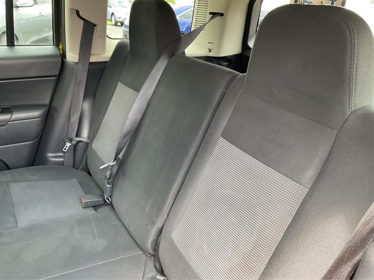 2012 Jeep Patriot Latitude 2WD (1C4NJPFA7CD) with an 2.0L L4 DOHC 16V engine, located at 401 Woodman Dr, Riverside, OH, 45431, (937) 908-9800, 39.760899, -84.123421 - 2012 Jeep Patriot Latitude 2WD - Photo#10