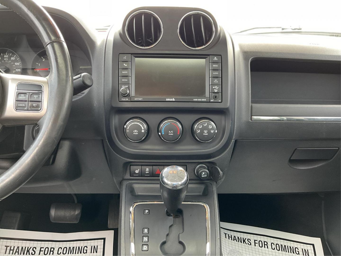 2012 Jeep Patriot Latitude 2WD (1C4NJPFA7CD) with an 2.0L L4 DOHC 16V engine, located at 401 Woodman Dr, Riverside, OH, 45431, (937) 908-9800, 39.760899, -84.123421 - 2012 Jeep Patriot Latitude 2WD - Photo#13