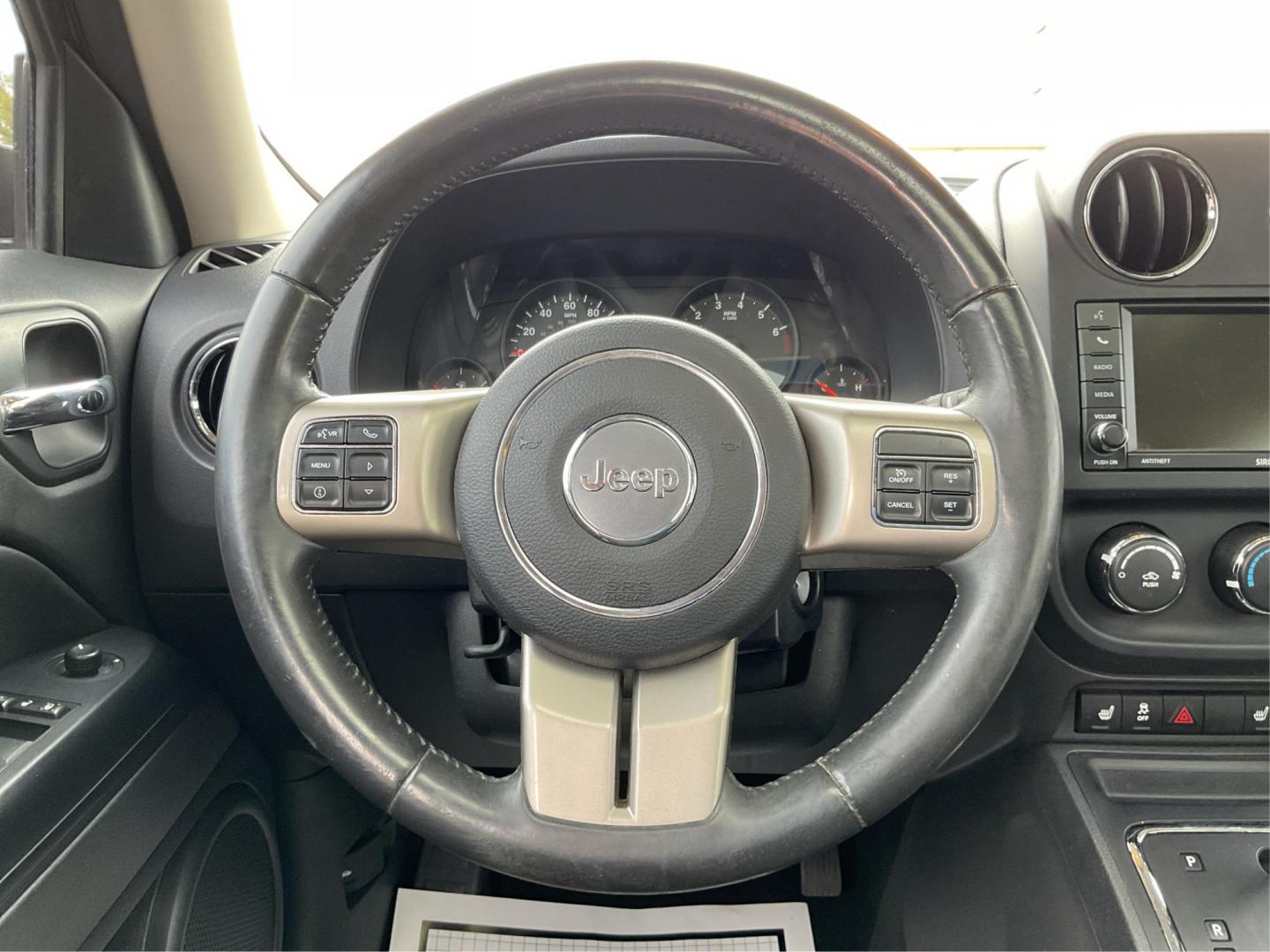 2012 Jeep Patriot Latitude 2WD (1C4NJPFA7CD) with an 2.0L L4 DOHC 16V engine, located at 401 Woodman Dr, Riverside, OH, 45431, (937) 908-9800, 39.760899, -84.123421 - 2012 Jeep Patriot Latitude 2WD - Photo#16