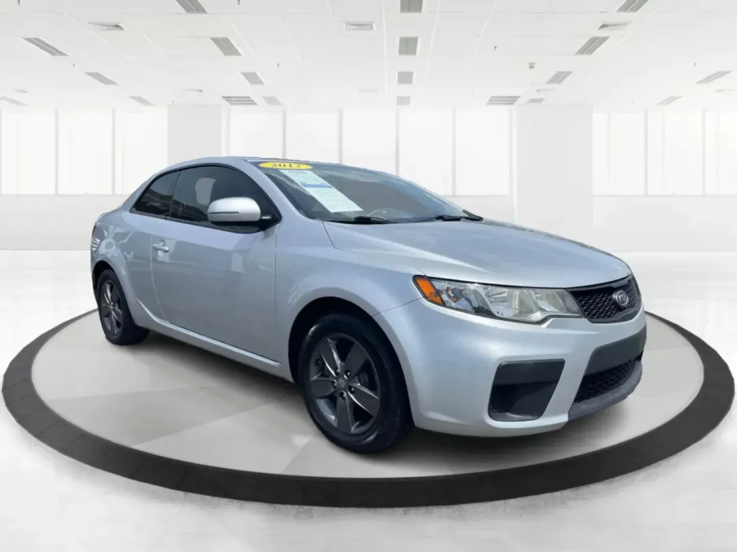 2012 Kia Forte Koup EX (KNAFU6A20C5) with an 2L I-4 DOHC engine, located at 8750 N County Rd 25A, Piqua, OH, 45356, (937) 908-9800, 40.164391, -84.232513 - **Unleash Your Driving Potential with the 2012 Kia Forte Koup EX at Advantage Car and Credit!**<br /> <br /> Are you ready to elevate your daily commute or weekend adventures in Fairborn, OH? The 2012 Kia Forte Koup EX is your ticket to an exciting driving experience that balances sportiness and pra - Photo#0