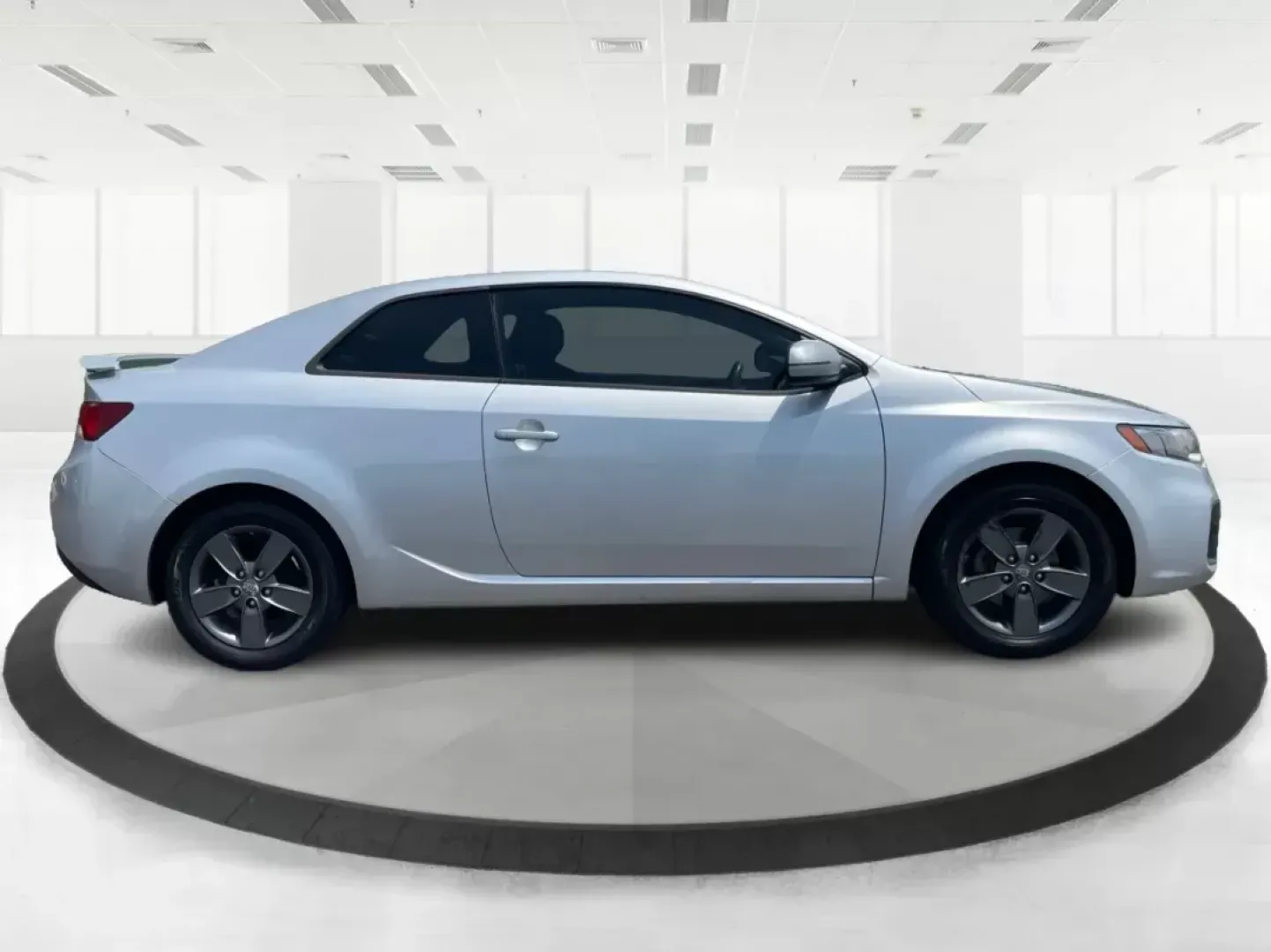 2012 Kia Forte Koup EX (KNAFU6A20C5) with an 2L I-4 DOHC engine, located at 8750 N County Rd 25A, Piqua, OH, 45356, (937) 908-9800, 40.164391, -84.232513 - **Unleash Your Driving Potential with the 2012 Kia Forte Koup EX at Advantage Car and Credit!**<br /> <br /> Are you ready to elevate your daily commute or weekend adventures in Fairborn, OH? The 2012 Kia Forte Koup EX is your ticket to an exciting driving experience that balances sportiness and pra - Photo#1
