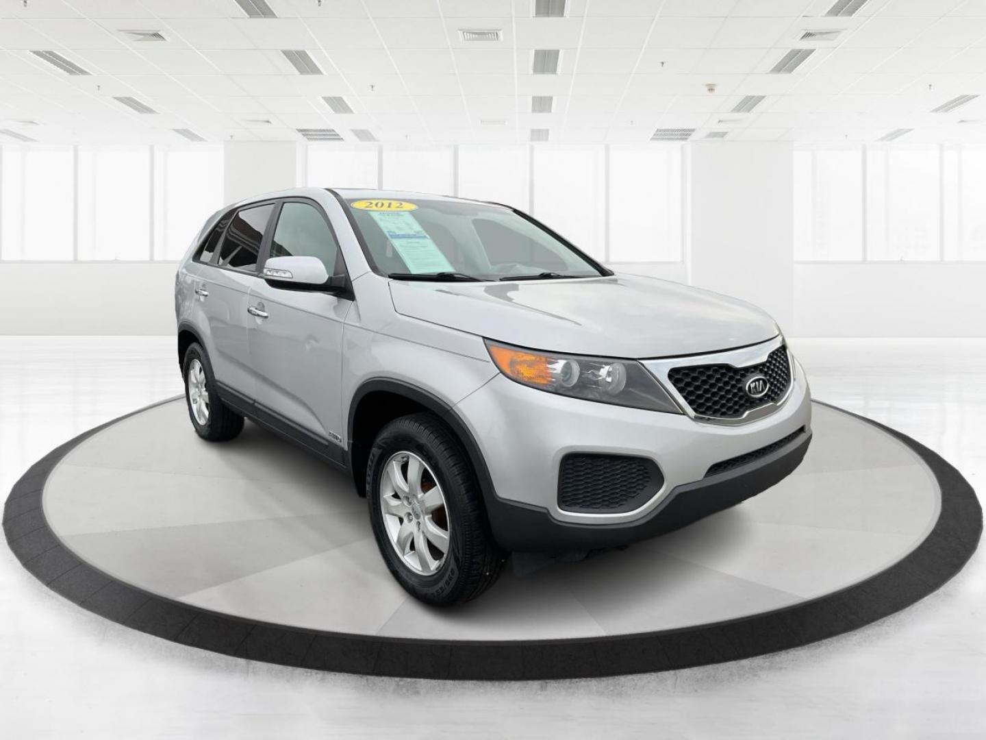 2012 Kia Sorento LX (5XYKTCA68CG) with an 2.4L I-4 gasoline direct injection engine, located at 4508 South Dixie Dr, Moraine, OH, 45439, (937) 908-9800, 39.689976, -84.218452 - 2012 Kia Sorento LX - Photo#0