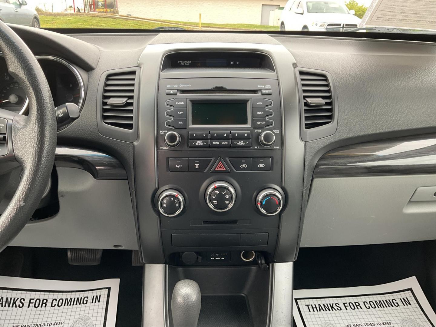 2012 Kia Sorento LX (5XYKTCA68CG) with an 2.4L I-4 gasoline direct injection engine, located at 4508 South Dixie Dr, Moraine, OH, 45439, (937) 908-9800, 39.689976, -84.218452 - 2012 Kia Sorento LX - Photo#12