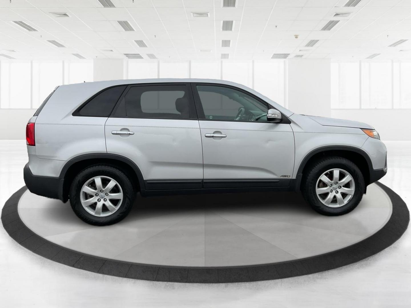2012 Kia Sorento LX (5XYKTCA68CG) with an 2.4L I-4 gasoline direct injection engine, located at 4508 South Dixie Dr, Moraine, OH, 45439, (937) 908-9800, 39.689976, -84.218452 - 2012 Kia Sorento LX - Photo#1