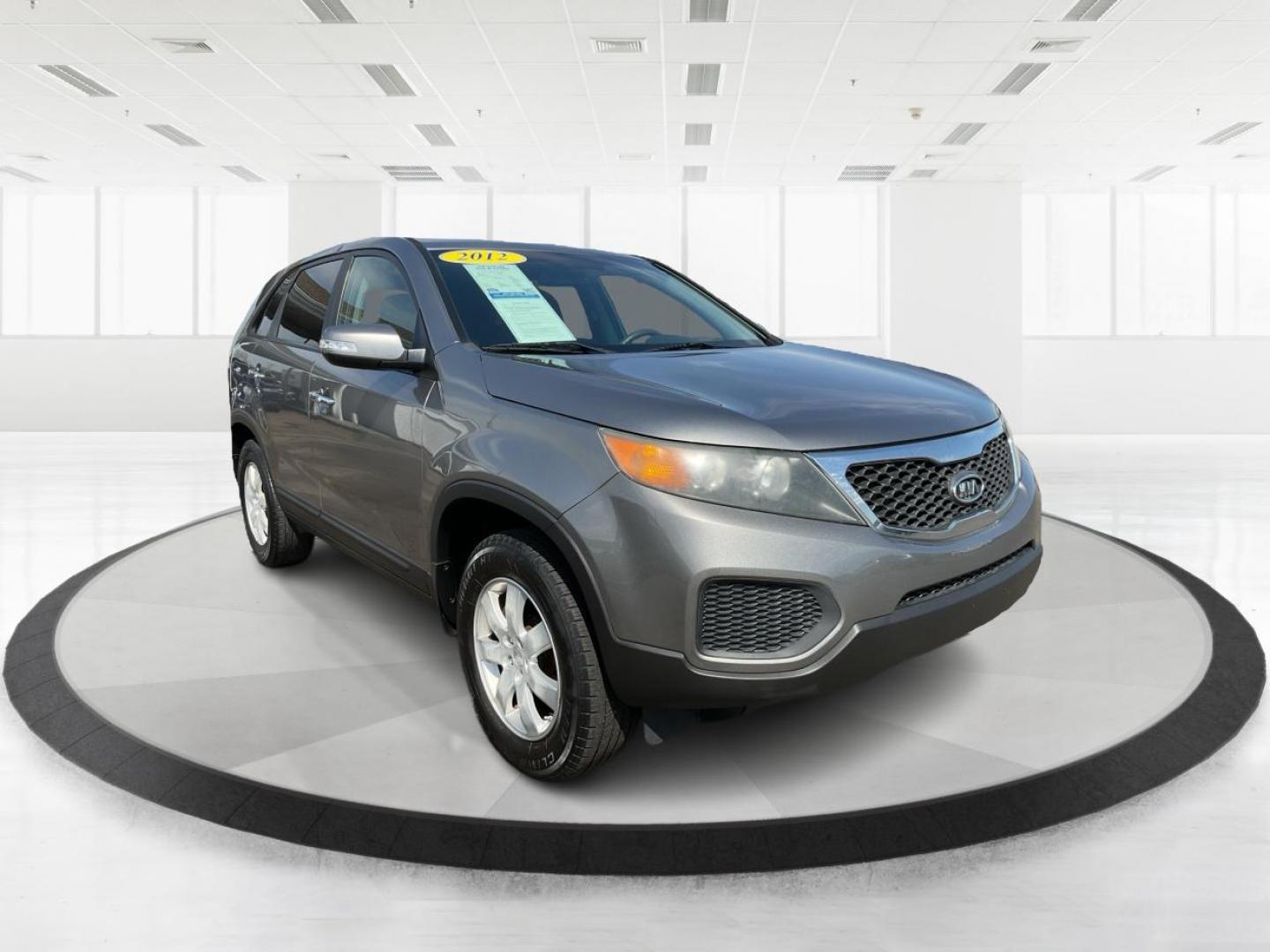 2012 Kia Sorento LX (5XYKT3A17CG) with an 2.4L I-4 DOHC engine, located at 401 Woodman Dr, Riverside, OH, 45431, (937) 908-9800, 39.760899, -84.123421 - 2012 Kia Sorento LX - Photo#0