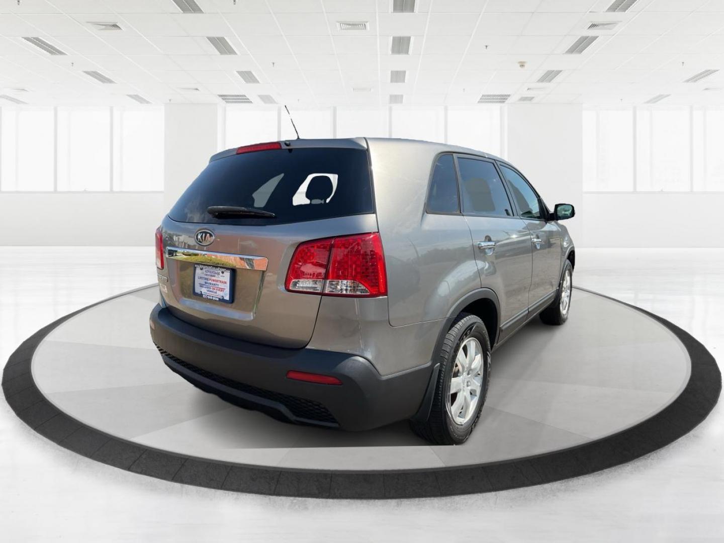 2012 Kia Sorento LX (5XYKT3A17CG) with an 2.4L I-4 DOHC engine, located at 401 Woodman Dr, Riverside, OH, 45431, (937) 908-9800, 39.760899, -84.123421 - 2012 Kia Sorento LX - Photo#2