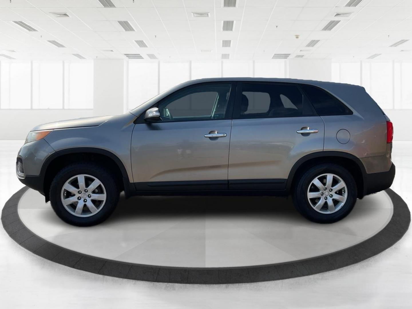 2012 Kia Sorento LX (5XYKT3A17CG) with an 2.4L I-4 DOHC engine, located at 401 Woodman Dr, Riverside, OH, 45431, (937) 908-9800, 39.760899, -84.123421 - 2012 Kia Sorento LX - Photo#5