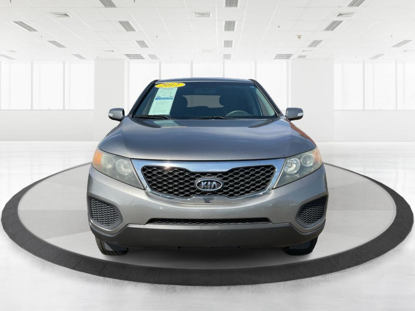 2012 Kia Sorento LX (5XYKT3A17CG) with an 2.4L I-4 DOHC engine, located at 401 Woodman Dr, Riverside, OH, 45431, (937) 908-9800, 39.760899, -84.123421 - 2012 Kia Sorento LX - Photo#6