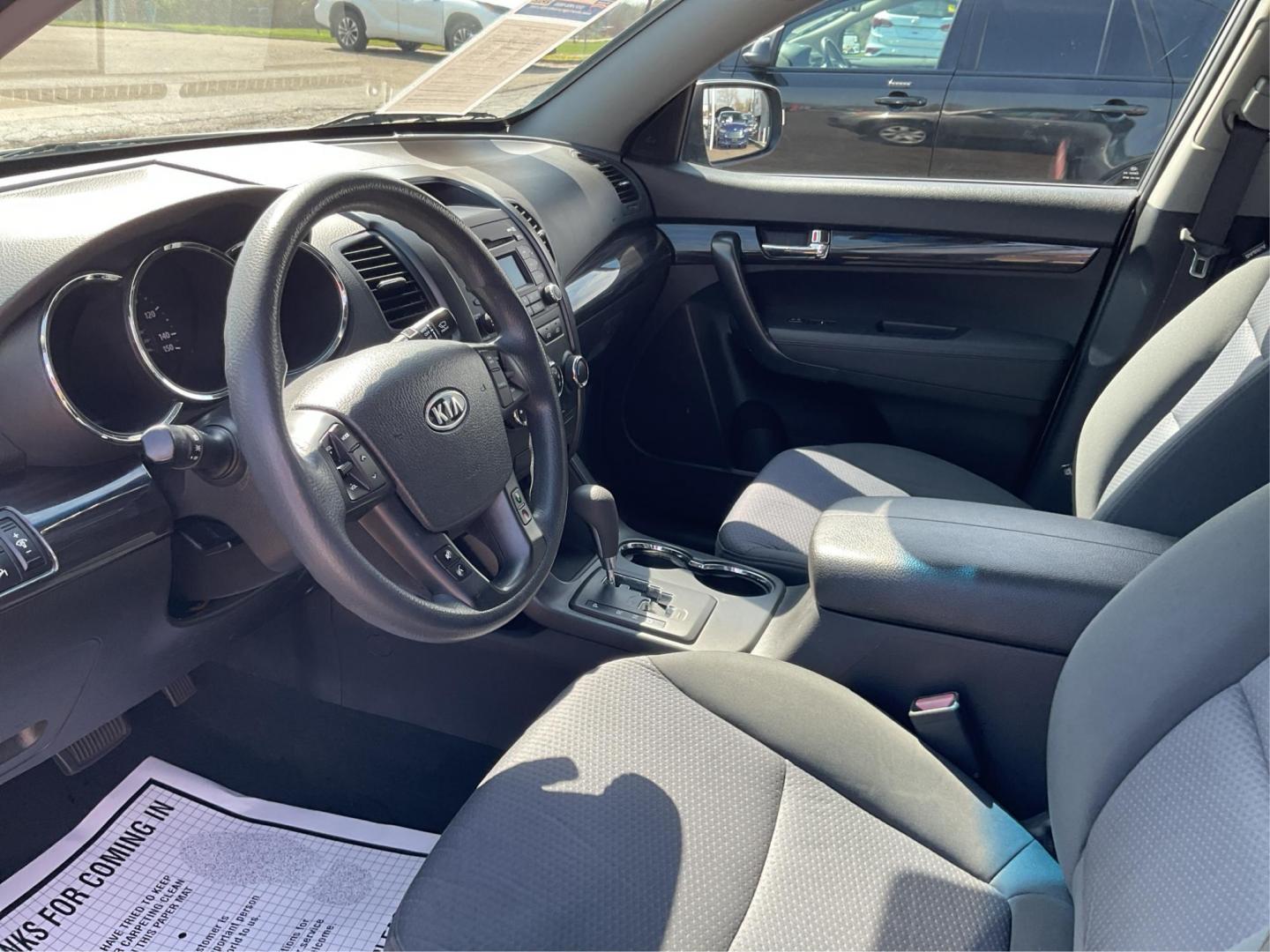 2012 Kia Sorento LX (5XYKT3A17CG) with an 2.4L I-4 DOHC engine, located at 401 Woodman Dr, Riverside, OH, 45431, (937) 908-9800, 39.760899, -84.123421 - 2012 Kia Sorento LX - Photo#8