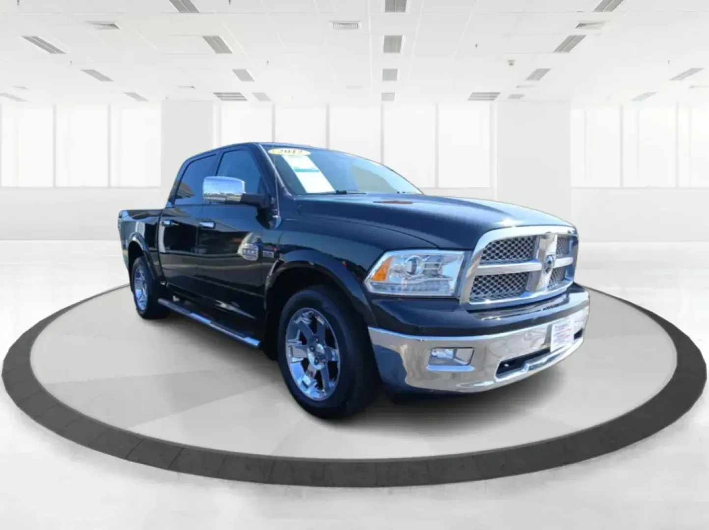 2012 Ram 1500 Laramie Longhorn Edition Crew Cab 4WD (1C6RD7PT6CS) with an 5.7L V8 OHV 16V engine, 6-Speed Automatic transmission, located at 1099 N County Rd 25A, Troy, OH, 45373, (937) 908-9800, 40.057079, -84.212883 - One Owner - Photo#0