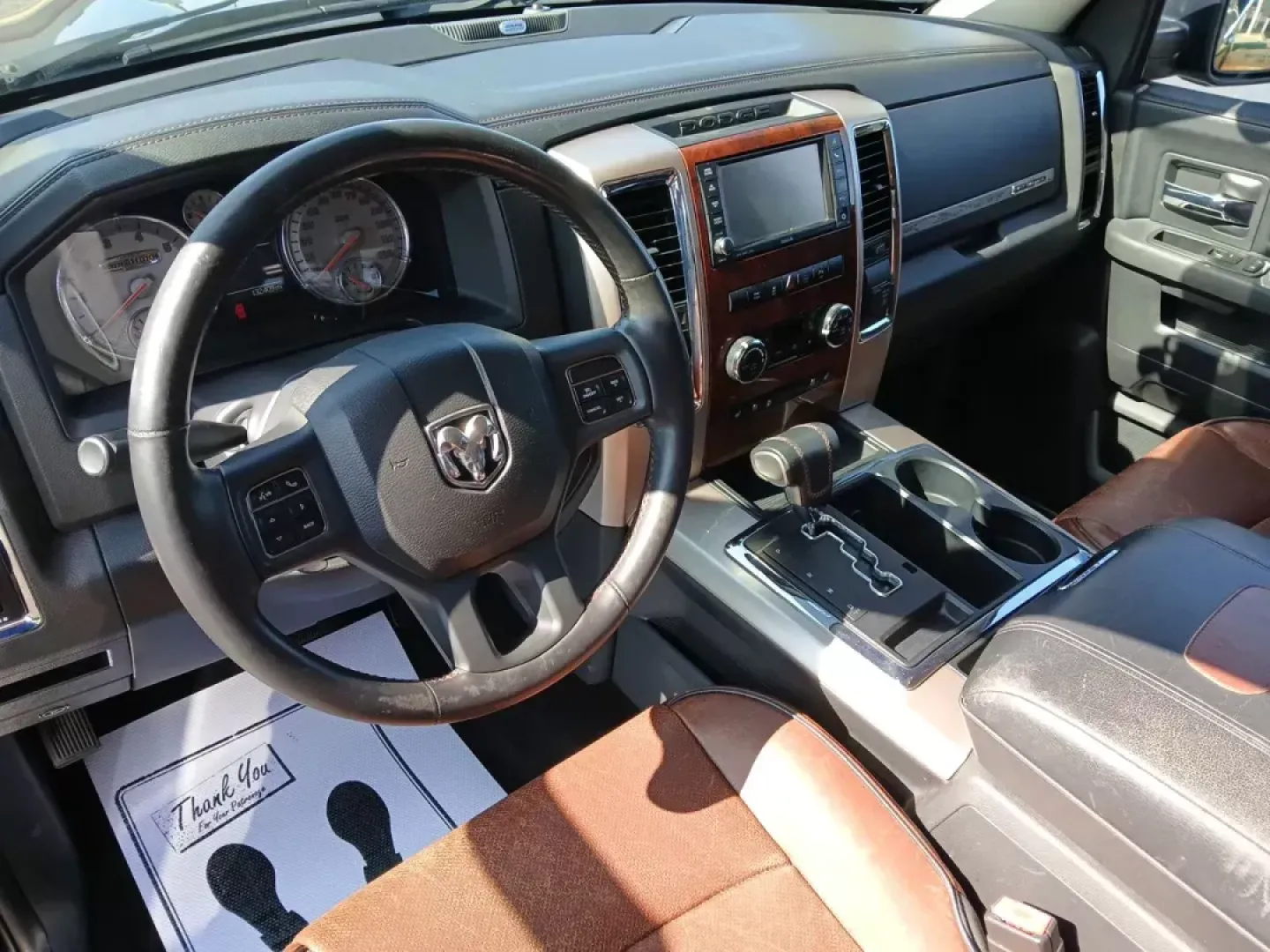 2012 Ram 1500 Laramie Longhorn Edition Crew Cab 4WD (1C6RD7PT6CS) with an 5.7L V8 OHV 16V engine, 6-Speed Automatic transmission, located at 1099 N County Rd 25A, Troy, OH, 45373, (937) 908-9800, 40.057079, -84.212883 - One Owner - Photo#9