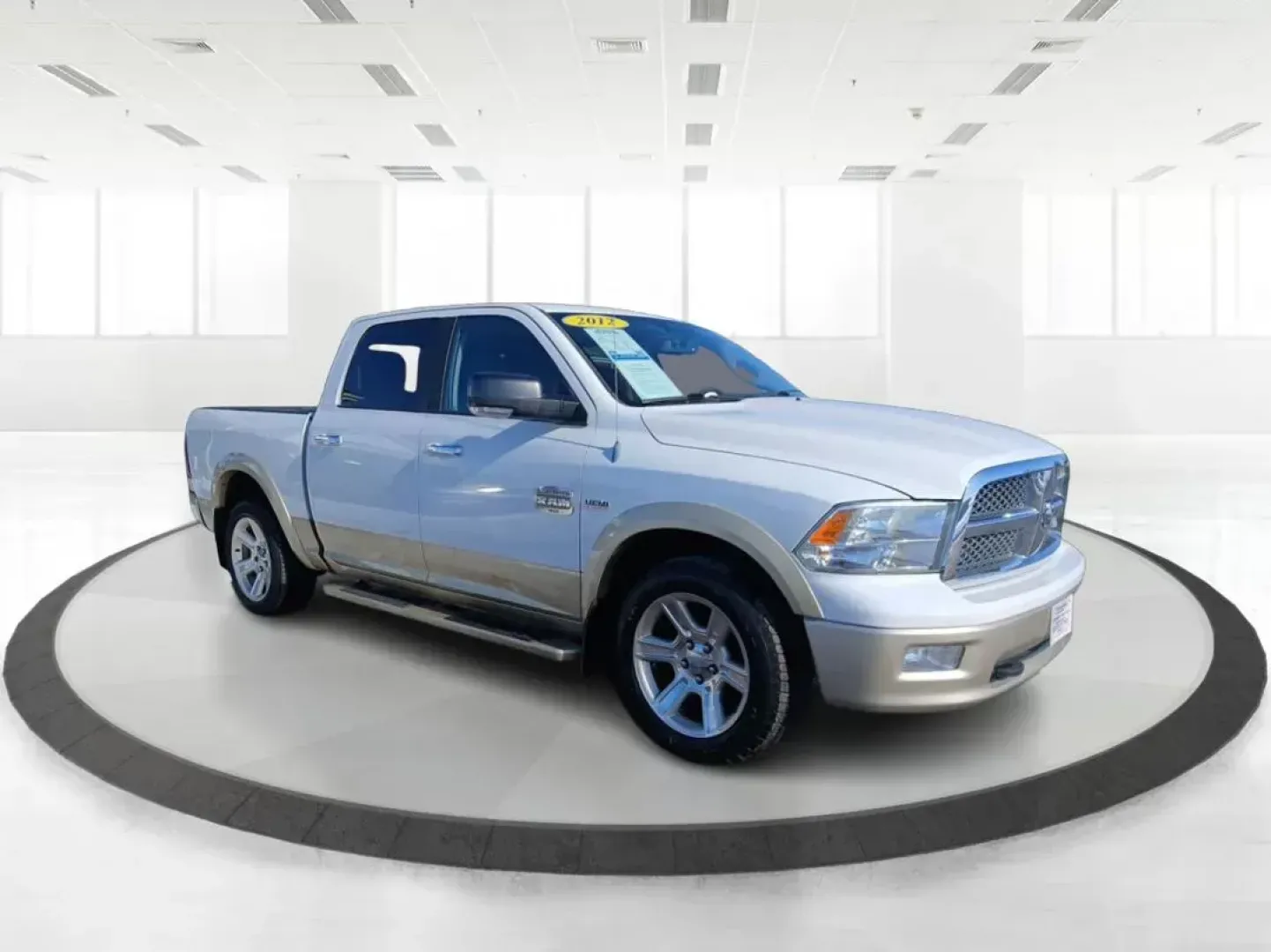 2012 Ram 1500 Laramie Longhorn Edition Crew Cab 4WD (1C6RD7PT8CS) with an 5.7L V8 OHV 16V engine, 6-Speed Automatic transmission, located at 4508 South Dixie Dr, Moraine, OH, 45439, (937) 908-9800, 39.689976, -84.218452 - 2012 Ram 1500 Laramie Longhorn Edition Crew Cab 4WD - Photo#0