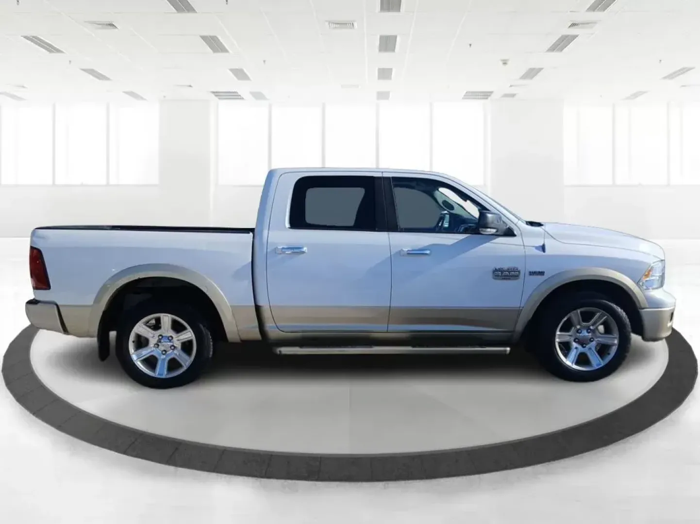 2012 Ram 1500 Laramie Longhorn Edition Crew Cab 4WD (1C6RD7PT8CS) with an 5.7L V8 OHV 16V engine, 6-Speed Automatic transmission, located at 4508 South Dixie Dr, Moraine, OH, 45439, (937) 908-9800, 39.689976, -84.218452 - 2012 Ram 1500 Laramie Longhorn Edition Crew Cab 4WD - Photo#1