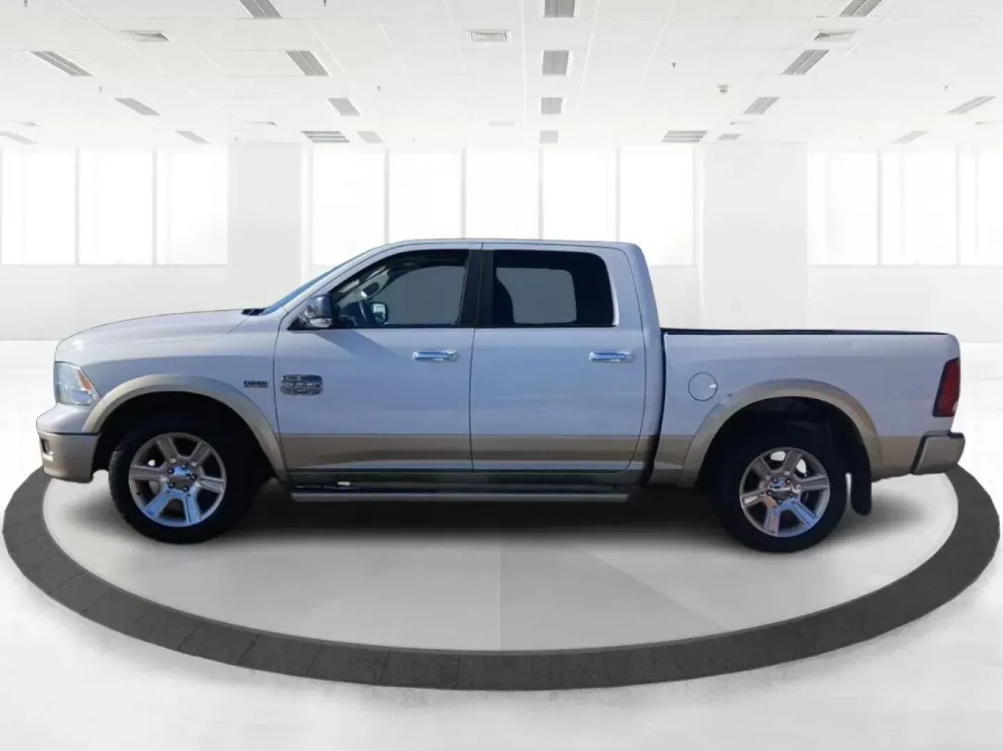 2012 Ram 1500 Laramie Longhorn Edition Crew Cab 4WD (1C6RD7PT8CS) with an 5.7L V8 OHV 16V engine, 6-Speed Automatic transmission, located at 4508 South Dixie Dr, Moraine, OH, 45439, (937) 908-9800, 39.689976, -84.218452 - 2012 Ram 1500 Laramie Longhorn Edition Crew Cab 4WD - Photo#5