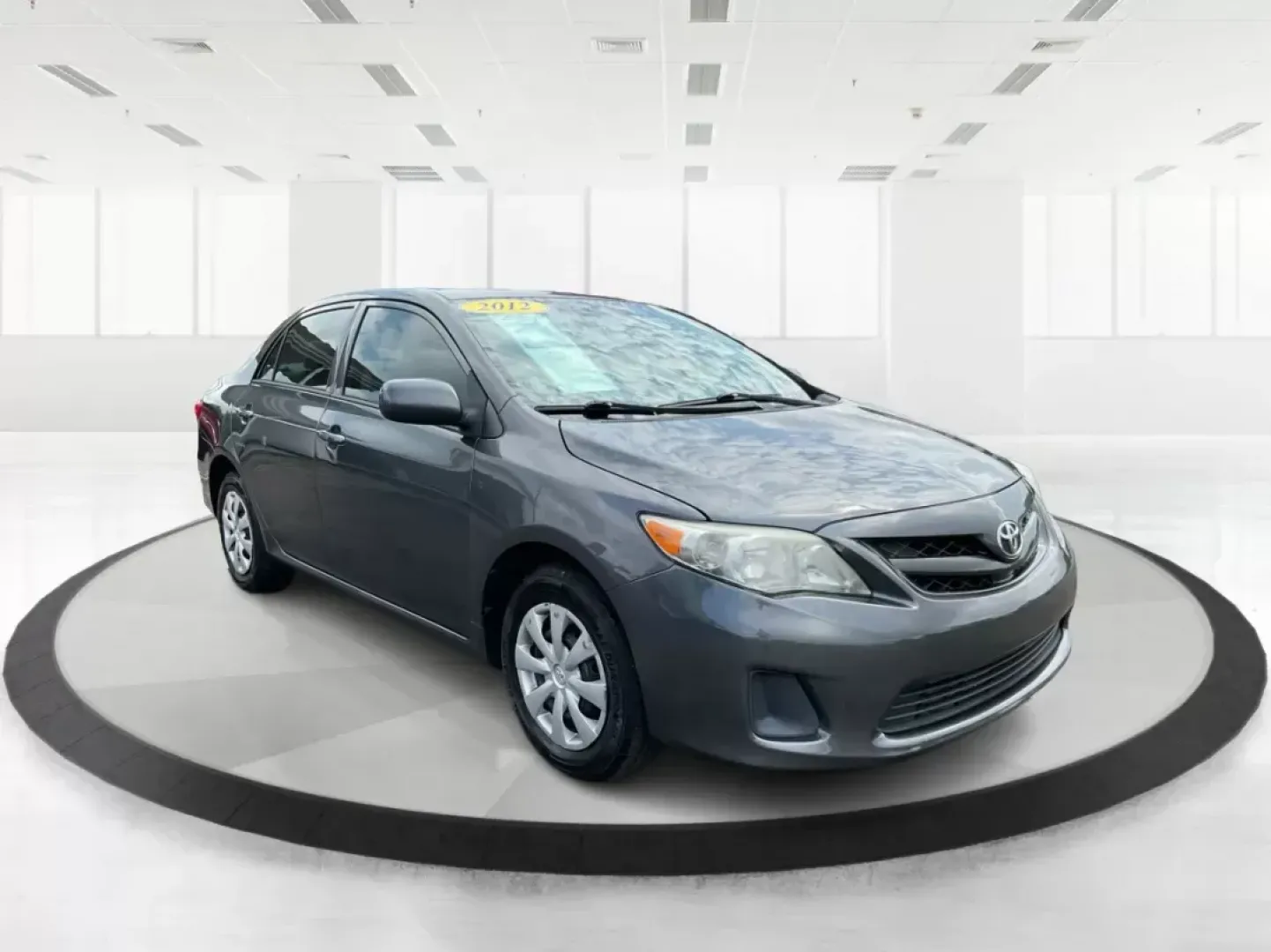 2012 Toyota Corolla LE (2T1BU4EEXCC) with an 1.8L I-4 DOHC engine, located at 401 Woodman Dr, Riverside, OH, 45431, (937) 908-9800, 39.760899, -84.123421 - **Drive Your Life Forward with the 2012 Toyota Corolla LE Perfect for Commuters and Families Alike!**<br /> <br /> Are you looking for a reliable, fuel-efficient vehicle that can handle your daily commute and weekend adventures? Look no further than the 2012 Toyota Corolla LE, a versatile sedan tha - Photo#0