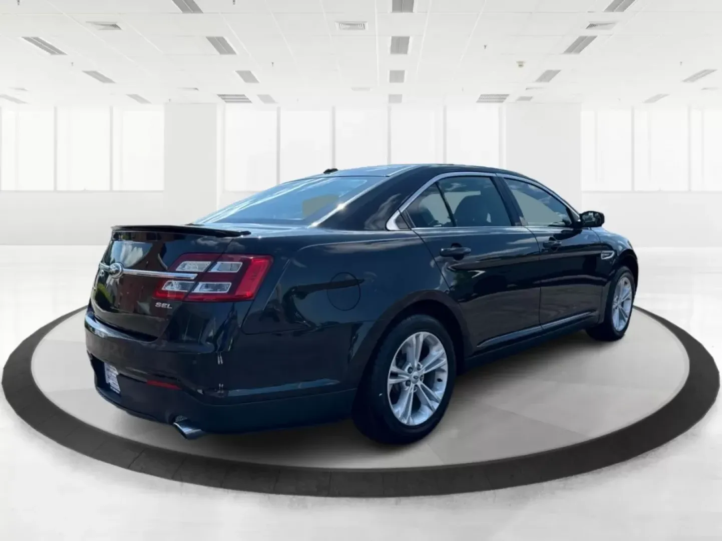 2013 Ford Taurus SEL (1FAHP2E87DG) with an EcoBoost 2L I-4 gasoline direct injection engine, located at 1099 N County Rd 25A, Troy, OH, 45373, (937) 908-9800, 40.057079, -84.212883 - ### Discover Your Next Adventure with the 2013 Ford Taurus SEL from Advantage Car and Credit!<br /> <br /> Are you seeking a reliable and stylish sedan for your daily commute, family road trips, or weekend adventures? Look no further! The 2013 Ford Taurus SEL, available at Advantage Car and Credit i - Photo#2
