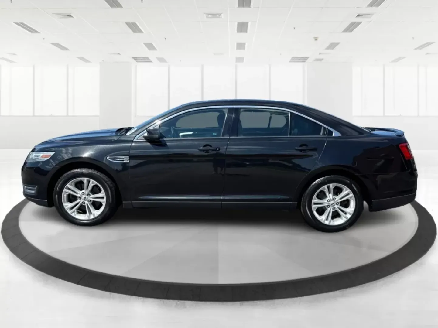 2013 Ford Taurus SEL (1FAHP2E87DG) with an EcoBoost 2L I-4 gasoline direct injection engine, located at 1099 N County Rd 25A, Troy, OH, 45373, (937) 908-9800, 40.057079, -84.212883 - ### Discover Your Next Adventure with the 2013 Ford Taurus SEL from Advantage Car and Credit!<br /> <br /> Are you seeking a reliable and stylish sedan for your daily commute, family road trips, or weekend adventures? Look no further! The 2013 Ford Taurus SEL, available at Advantage Car and Credit i - Photo#5