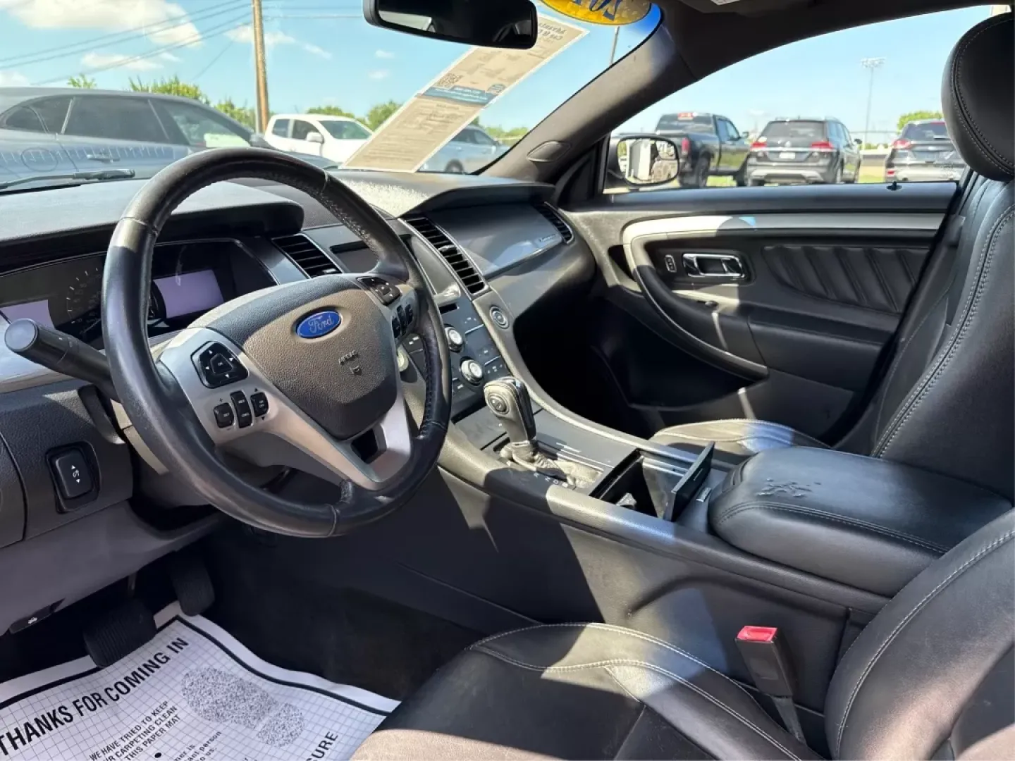2013 Ford Taurus SEL (1FAHP2E87DG) with an EcoBoost 2L I-4 gasoline direct injection engine, located at 1099 N County Rd 25A, Troy, OH, 45373, (937) 908-9800, 40.057079, -84.212883 - ### Discover Your Next Adventure with the 2013 Ford Taurus SEL from Advantage Car and Credit!<br /> <br /> Are you seeking a reliable and stylish sedan for your daily commute, family road trips, or weekend adventures? Look no further! The 2013 Ford Taurus SEL, available at Advantage Car and Credit i - Photo#9
