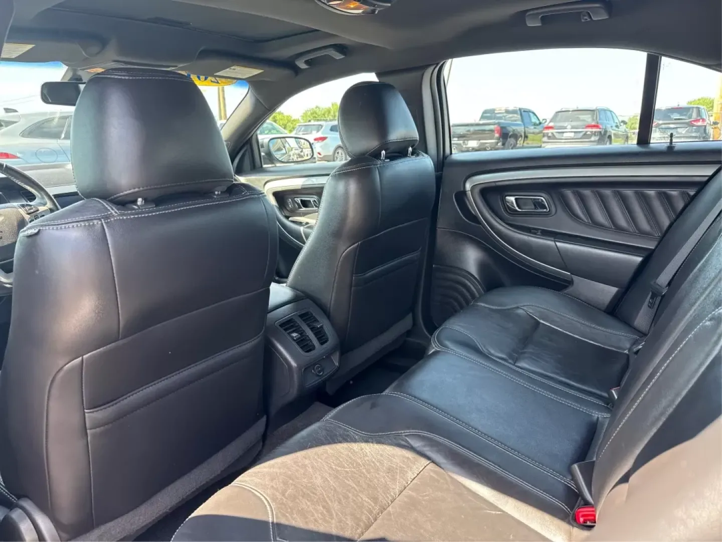 2013 Ford Taurus SEL (1FAHP2E87DG) with an EcoBoost 2L I-4 gasoline direct injection engine, located at 1099 N County Rd 25A, Troy, OH, 45373, (937) 908-9800, 40.057079, -84.212883 - ### Discover Your Next Adventure with the 2013 Ford Taurus SEL from Advantage Car and Credit!<br /> <br /> Are you seeking a reliable and stylish sedan for your daily commute, family road trips, or weekend adventures? Look no further! The 2013 Ford Taurus SEL, available at Advantage Car and Credit i - Photo#10