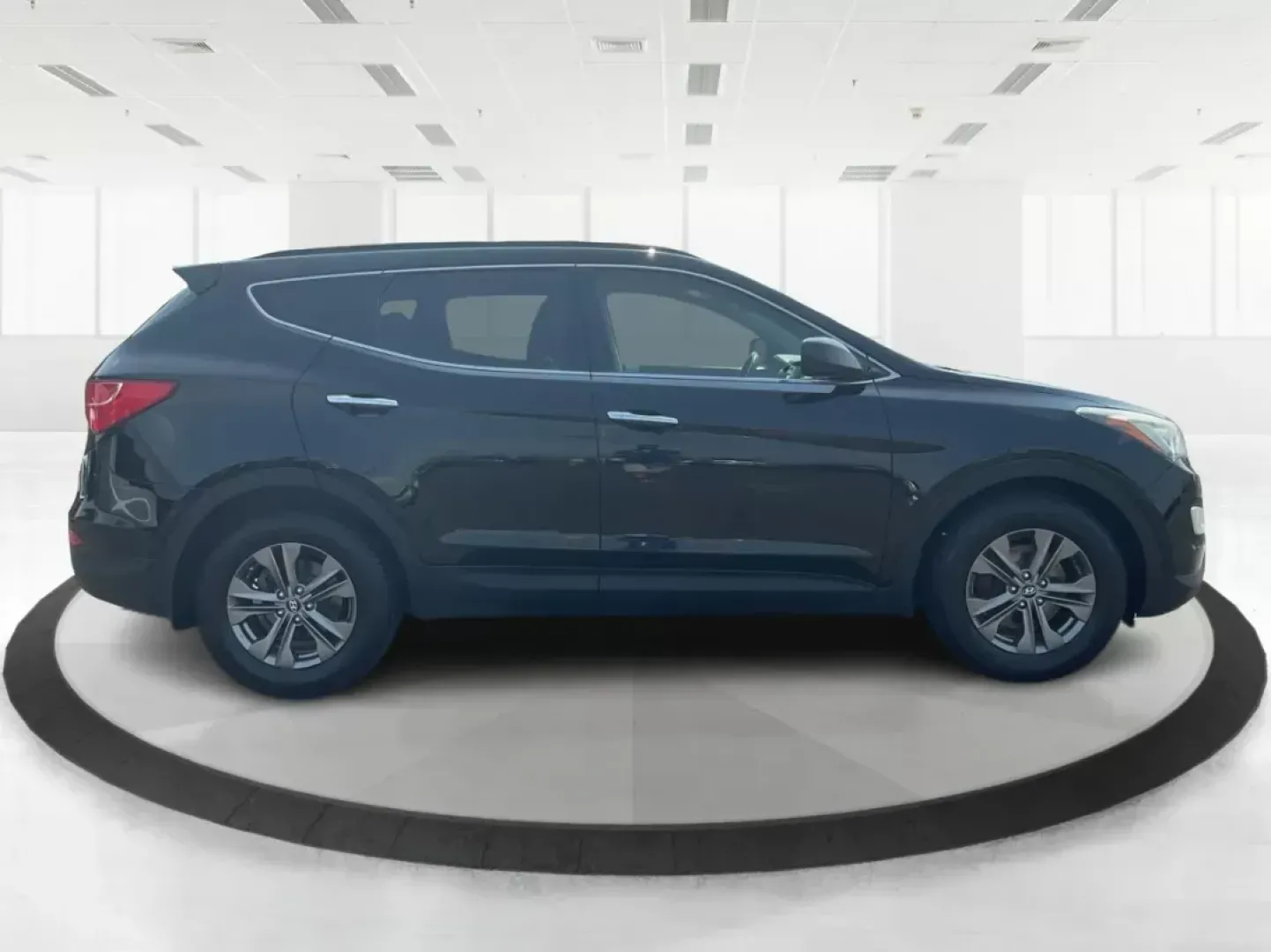 2013 Twilight Black Hyundai Santa Fe Sport 2.4 AWD (5XYZUDLB5DG) with an 2.4L L4 DOHC 16V engine, 6-Speed Automatic transmission, located at 4508 South Dixie Dr, Moraine, OH, 45439, (937) 908-9800, 39.689976, -84.218452 - **Explore Adventure with the 2013 Hyundai Santa Fe Sport in Fairborn, OH!**<br /> <br /> Are you ready to elevate your family adventures or tackle daily commutes with style and reliability? Look no further than the stunning 2013 Hyundai Santa Fe Sport 2.4 AWD, available at Advantage Car and Credit, - Photo#1