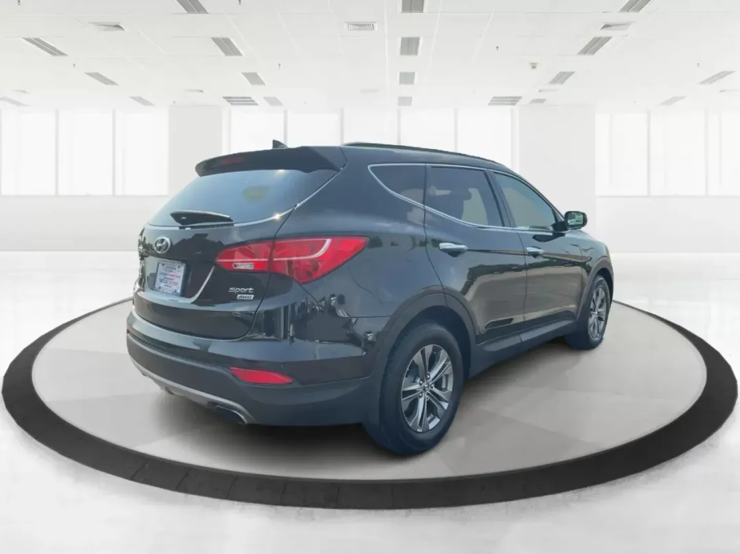 2013 Twilight Black Hyundai Santa Fe Sport 2.4 AWD (5XYZUDLB5DG) with an 2.4L L4 DOHC 16V engine, 6-Speed Automatic transmission, located at 4508 South Dixie Dr, Moraine, OH, 45439, (937) 908-9800, 39.689976, -84.218452 - **Explore Adventure with the 2013 Hyundai Santa Fe Sport in Fairborn, OH!**<br /> <br /> Are you ready to elevate your family adventures or tackle daily commutes with style and reliability? Look no further than the stunning 2013 Hyundai Santa Fe Sport 2.4 AWD, available at Advantage Car and Credit, - Photo#2