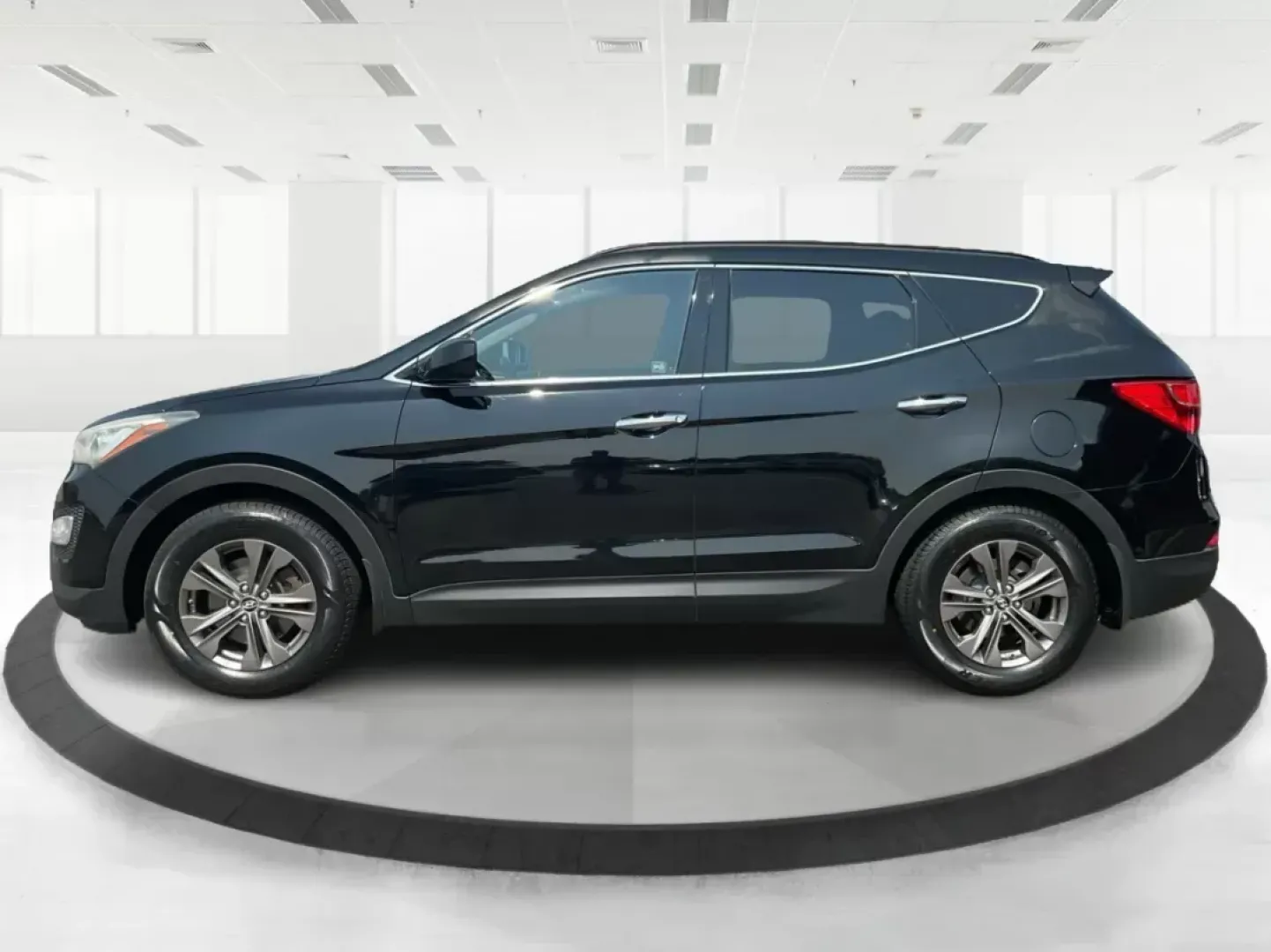 2013 Twilight Black Hyundai Santa Fe Sport 2.4 AWD (5XYZUDLB5DG) with an 2.4L L4 DOHC 16V engine, 6-Speed Automatic transmission, located at 4508 South Dixie Dr, Moraine, OH, 45439, (937) 908-9800, 39.689976, -84.218452 - **Explore Adventure with the 2013 Hyundai Santa Fe Sport in Fairborn, OH!**<br /> <br /> Are you ready to elevate your family adventures or tackle daily commutes with style and reliability? Look no further than the stunning 2013 Hyundai Santa Fe Sport 2.4 AWD, available at Advantage Car and Credit, - Photo#5