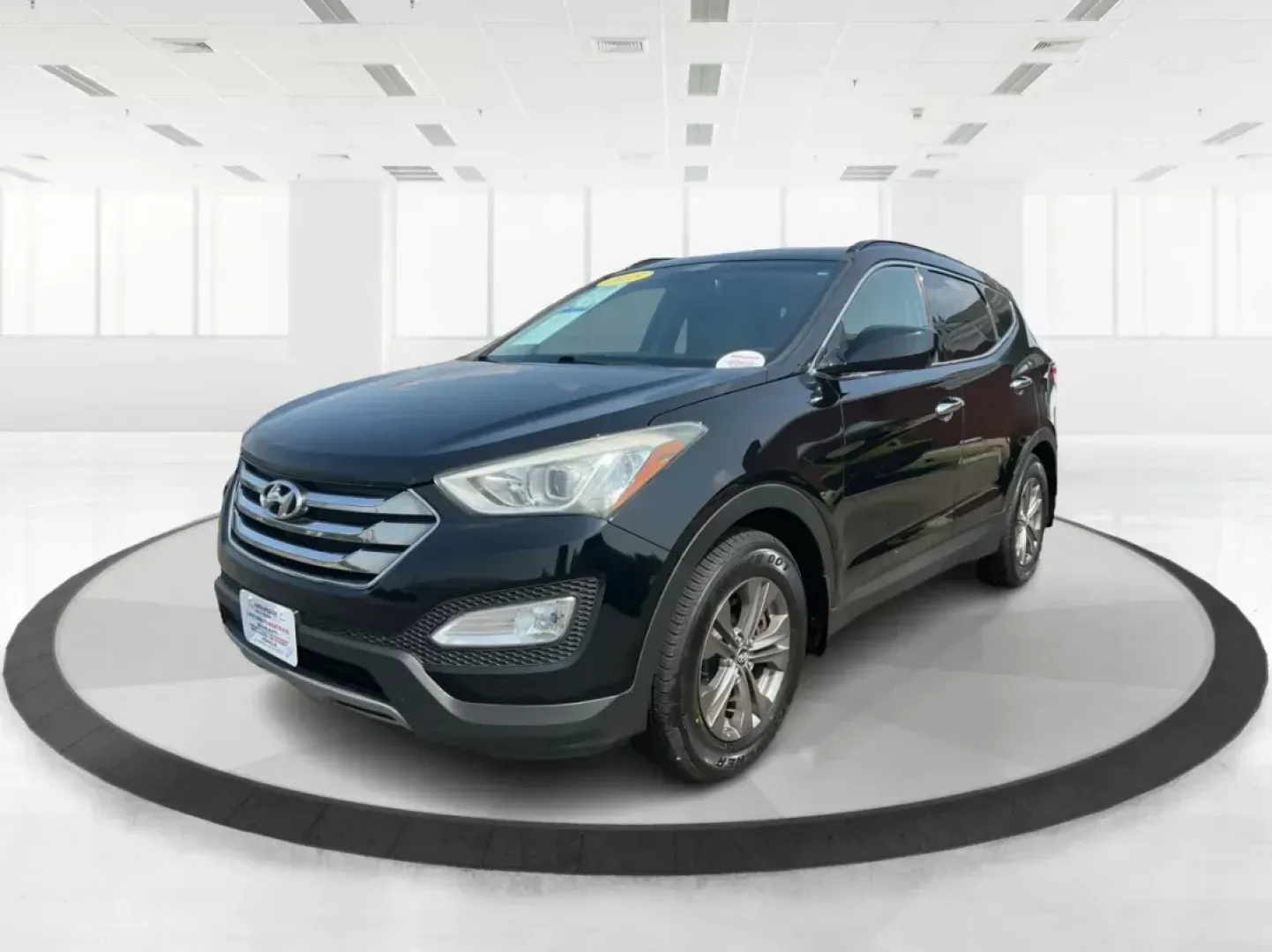 2013 Twilight Black Hyundai Santa Fe Sport 2.4 AWD (5XYZUDLB5DG) with an 2.4L L4 DOHC 16V engine, 6-Speed Automatic transmission, located at 4508 South Dixie Dr, Moraine, OH, 45439, (937) 908-9800, 39.689976, -84.218452 - **Explore Adventure with the 2013 Hyundai Santa Fe Sport in Fairborn, OH!**<br /> <br /> Are you ready to elevate your family adventures or tackle daily commutes with style and reliability? Look no further than the stunning 2013 Hyundai Santa Fe Sport 2.4 AWD, available at Advantage Car and Credit, - Photo#7