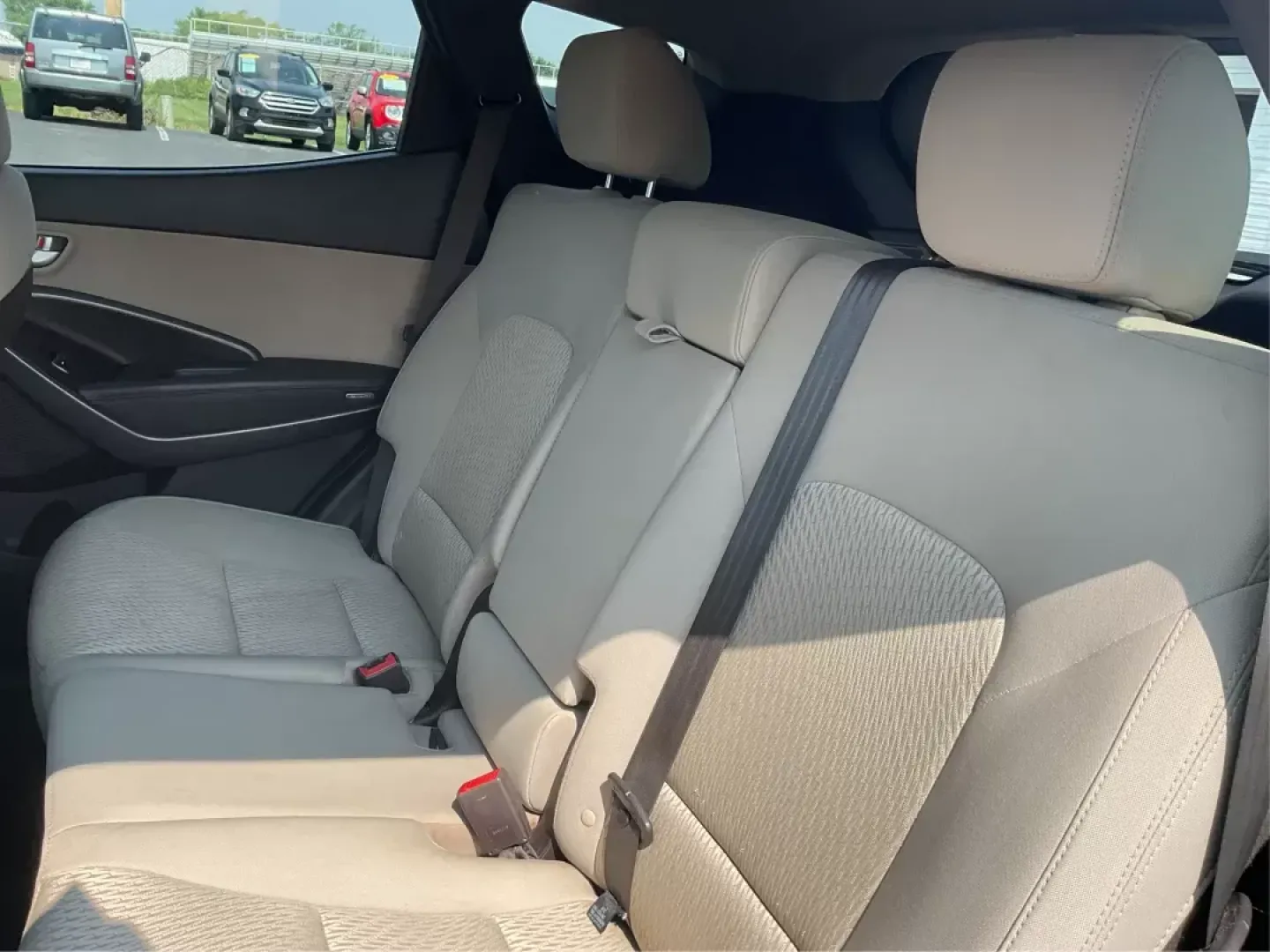 2013 Twilight Black Hyundai Santa Fe Sport 2.4 AWD (5XYZUDLB5DG) with an 2.4L L4 DOHC 16V engine, 6-Speed Automatic transmission, located at 4508 South Dixie Dr, Moraine, OH, 45439, (937) 908-9800, 39.689976, -84.218452 - **Explore Adventure with the 2013 Hyundai Santa Fe Sport in Fairborn, OH!**<br /> <br /> Are you ready to elevate your family adventures or tackle daily commutes with style and reliability? Look no further than the stunning 2013 Hyundai Santa Fe Sport 2.4 AWD, available at Advantage Car and Credit, - Photo#9