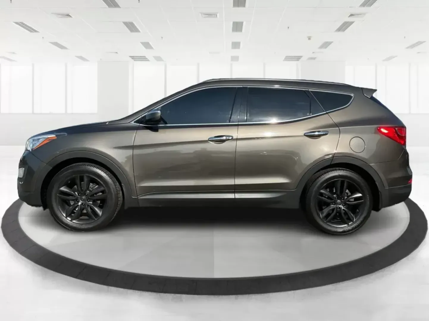 2013 Hyundai Santa Fe Sport 2.0 AWD (5XYZUDLA2DG) with an 2.0L L4 DOHC 16V engine, 6-Speed Automatic transmission, located at 1099 N County Rd 25A, Troy, OH, 45373, (937) 908-9800, 40.057079, -84.212883 - **Experience Adventure with the 2013 Hyundai Santa Fe Sport 2.0 AWD at Advantage Car and Credit!**<br /> <br /> Are you ready to elevate your lifestyle with a vehicle perfectly tailored for your adventures? The 2013 Hyundai Santa Fe Sport 2.0 AWD is not just a mode of transportation; it's a versatil - Photo#5