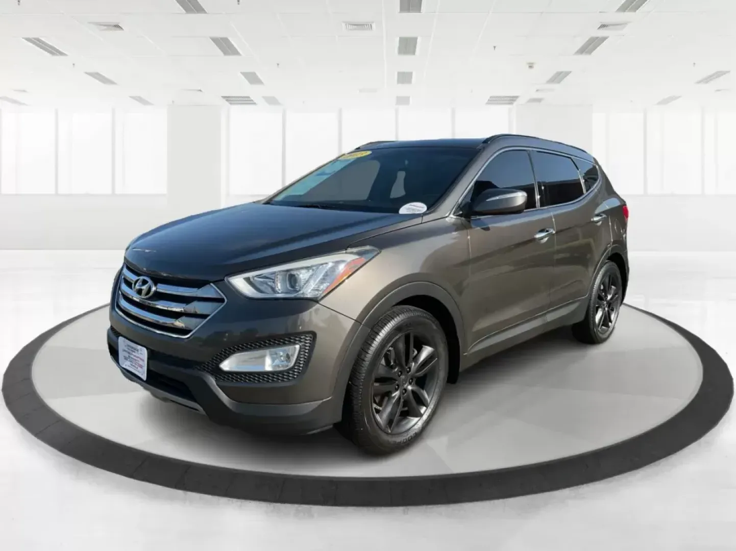 2013 Hyundai Santa Fe Sport 2.0 AWD (5XYZUDLA2DG) with an 2.0L L4 DOHC 16V engine, 6-Speed Automatic transmission, located at 1099 N County Rd 25A, Troy, OH, 45373, (937) 908-9800, 40.057079, -84.212883 - **Experience Adventure with the 2013 Hyundai Santa Fe Sport 2.0 AWD at Advantage Car and Credit!**<br /> <br /> Are you ready to elevate your lifestyle with a vehicle perfectly tailored for your adventures? The 2013 Hyundai Santa Fe Sport 2.0 AWD is not just a mode of transportation; it's a versatil - Photo#7