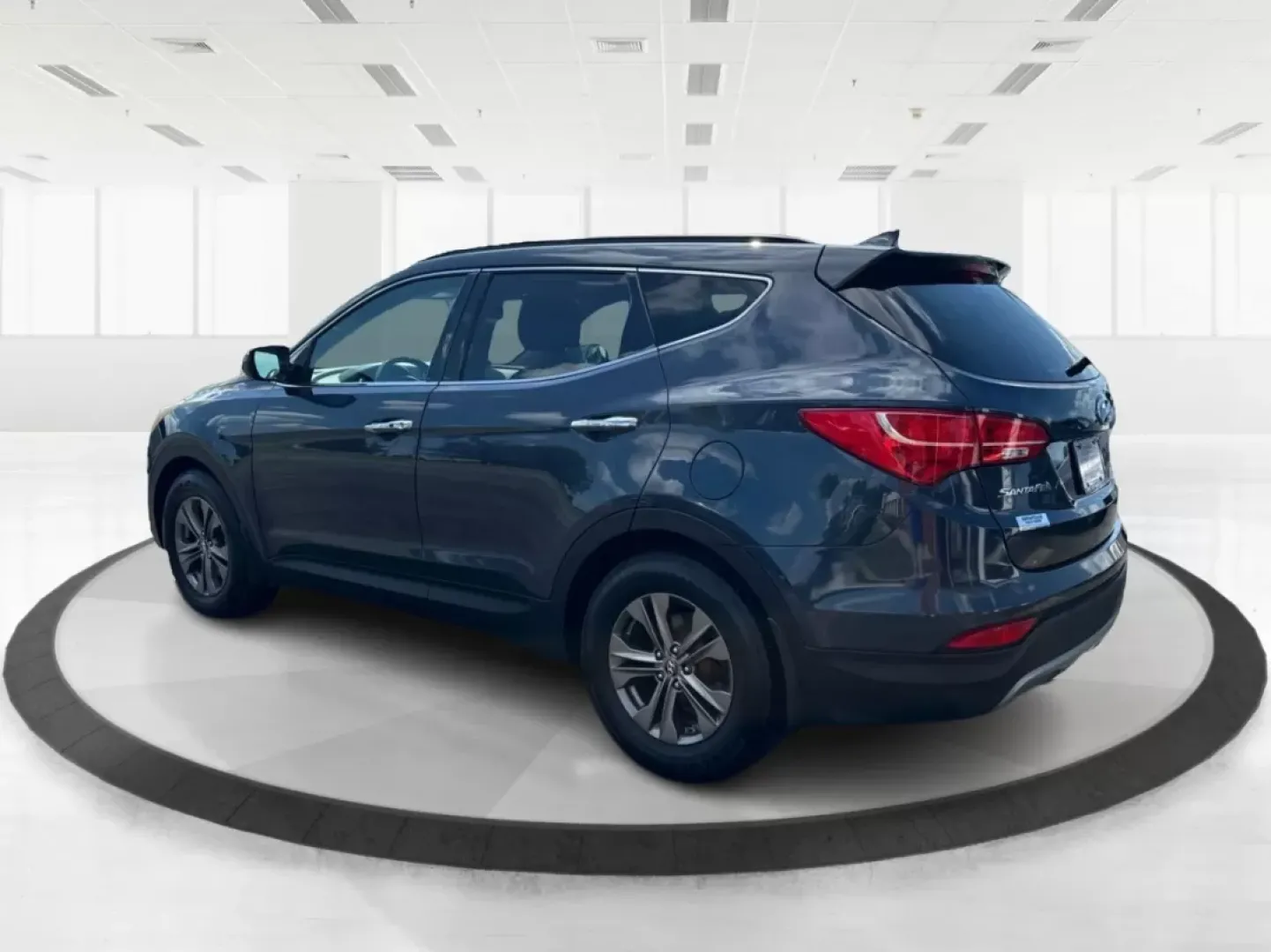 2013 Hyundai Santa Fe Sport (5XYZUDLB4DG) with an Theta II 2.4L I-4 gasoline direct injection engine, located at 401 Woodman Dr, Riverside, OH, 45431, (937) 908-9800, 39.760899, -84.123421 - 2013 Hyundai Santa Fe Sport - Photo#4