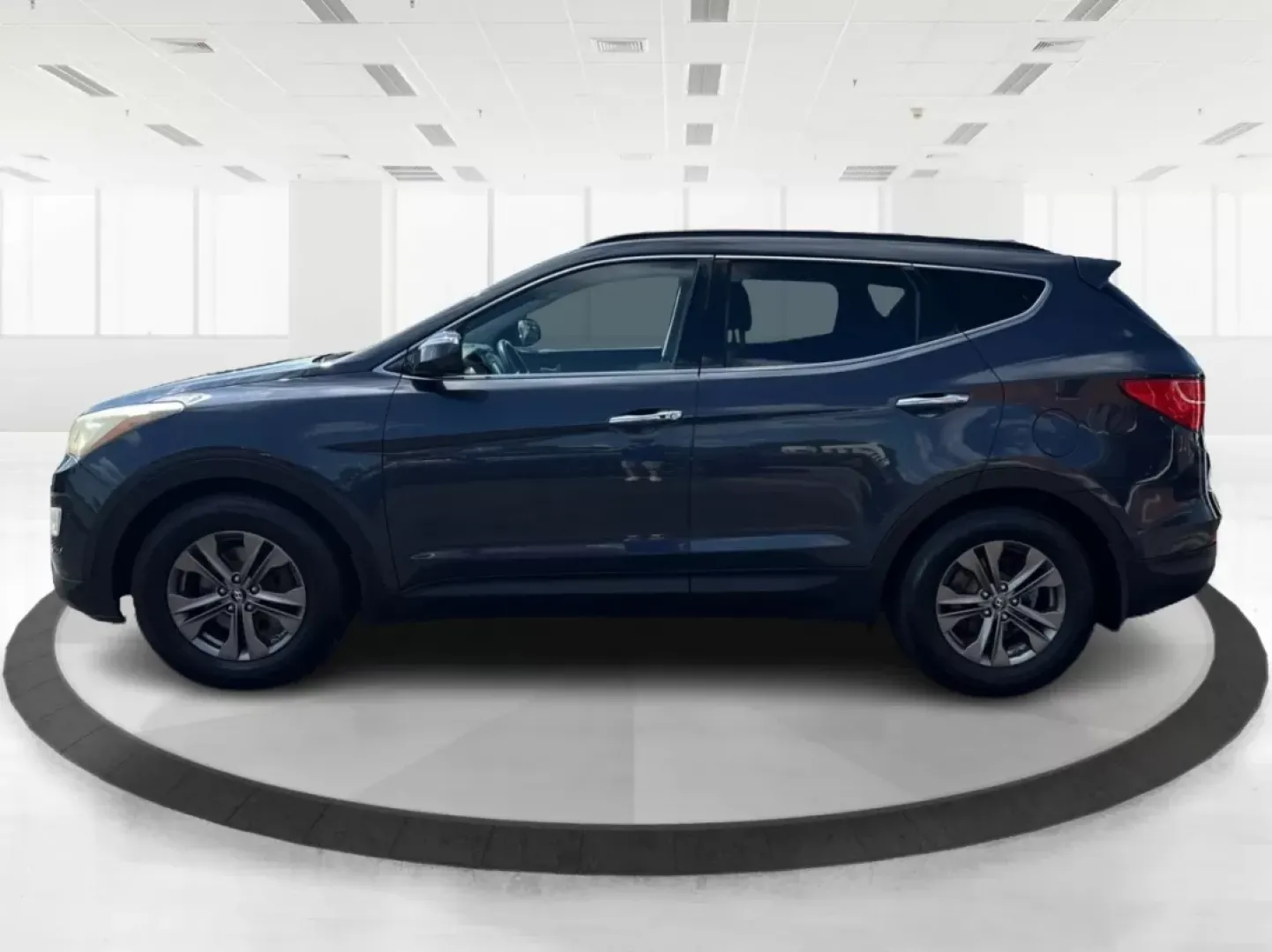 2013 Hyundai Santa Fe Sport (5XYZUDLB4DG) with an Theta II 2.4L I-4 gasoline direct injection engine, located at 401 Woodman Dr, Riverside, OH, 45431, (937) 908-9800, 39.760899, -84.123421 - 2013 Hyundai Santa Fe Sport - Photo#5
