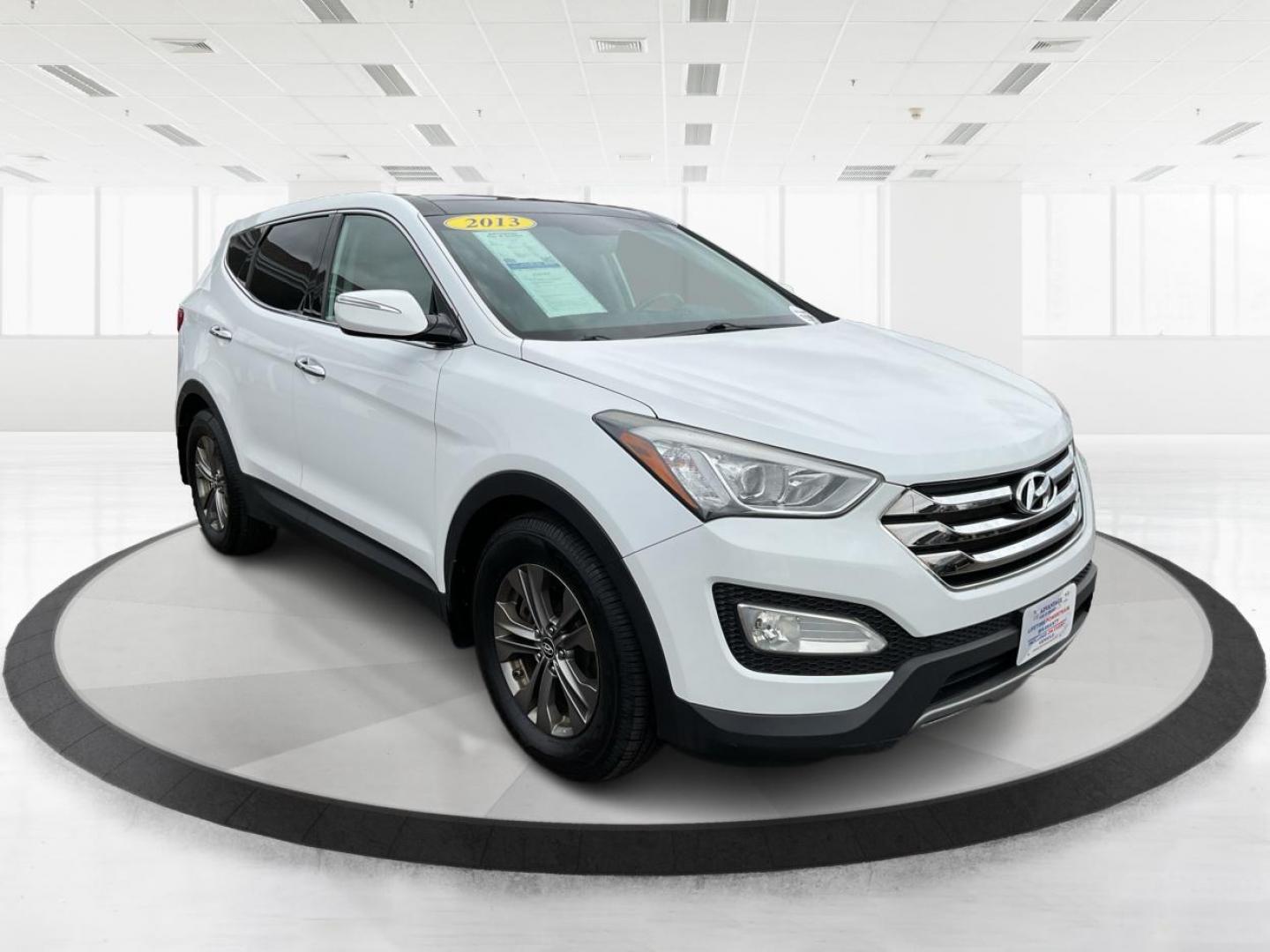 2013 Hyundai Santa Fe Sport (5XYZU3LB9DG) with an Theta II 2.4L I-4 gasoline direct injection engine, located at 880 E. National Road, Vandalia, OH, 45377, (937) 908-9800, 39.891918, -84.183594 - One Owner - Photo#0