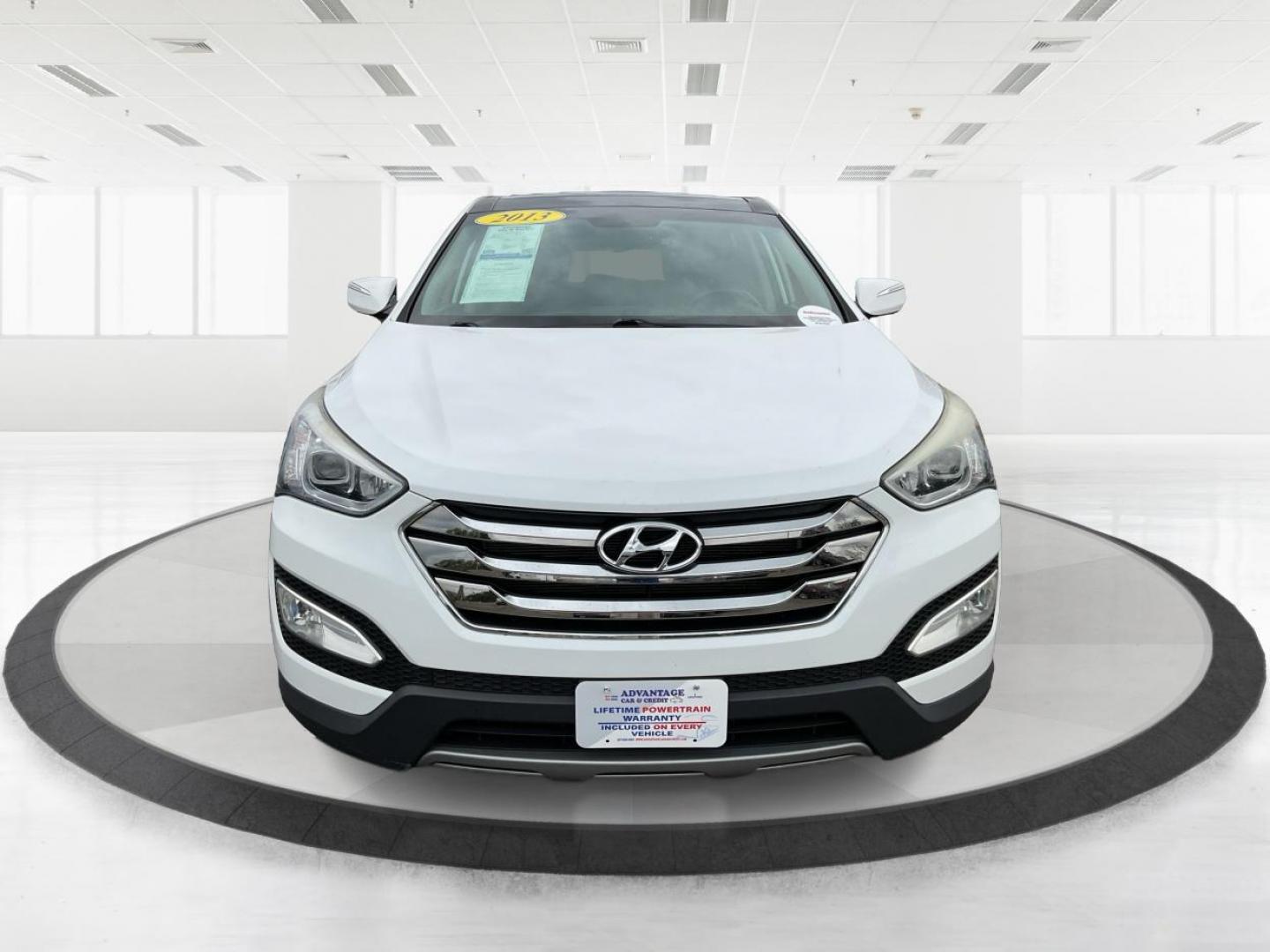 2013 Hyundai Santa Fe Sport (5XYZU3LB9DG) with an Theta II 2.4L I-4 gasoline direct injection engine, located at 880 E. National Road, Vandalia, OH, 45377, (937) 908-9800, 39.891918, -84.183594 - One Owner - Photo#6