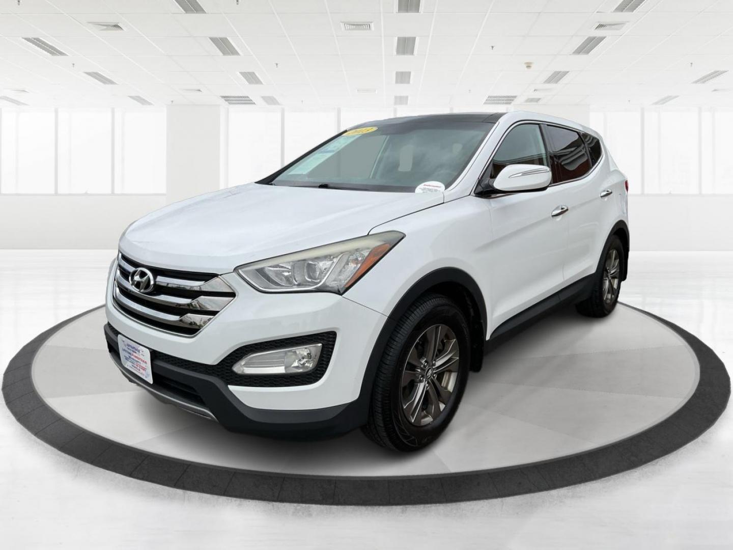 2013 Hyundai Santa Fe Sport (5XYZU3LB9DG) with an Theta II 2.4L I-4 gasoline direct injection engine, located at 880 E. National Road, Vandalia, OH, 45377, (937) 908-9800, 39.891918, -84.183594 - One Owner - Photo#7