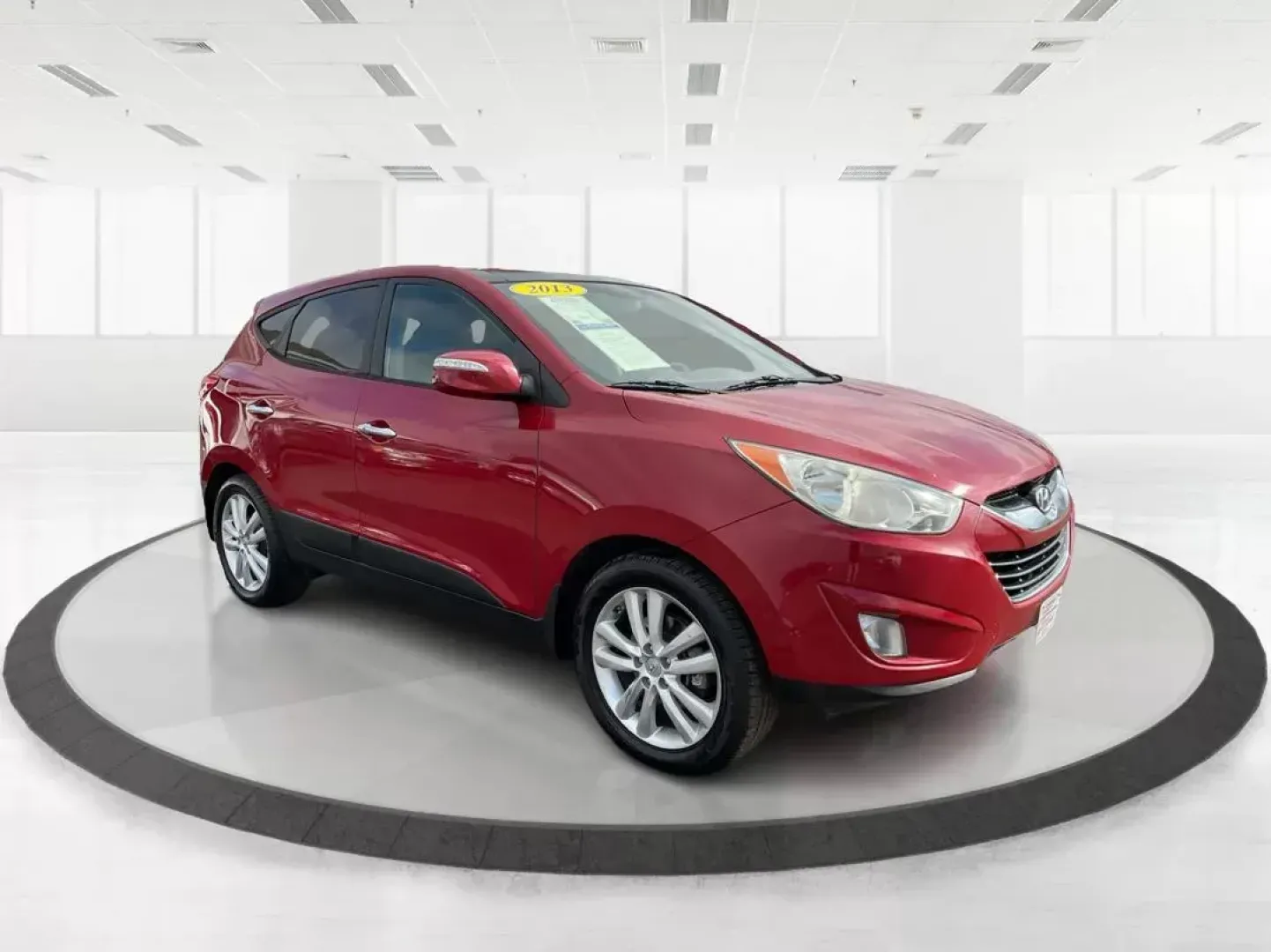 2013 Hyundai Tucson Limited (KM8JU3AC4DU) with an Theta II 2.4L I-4 DOHC engine, located at 1099 N County Rd 25A, Troy, OH, 45373, (937) 908-9800, 40.057079, -84.212883 - 2013 Hyundai Tucson Limited - Photo#0