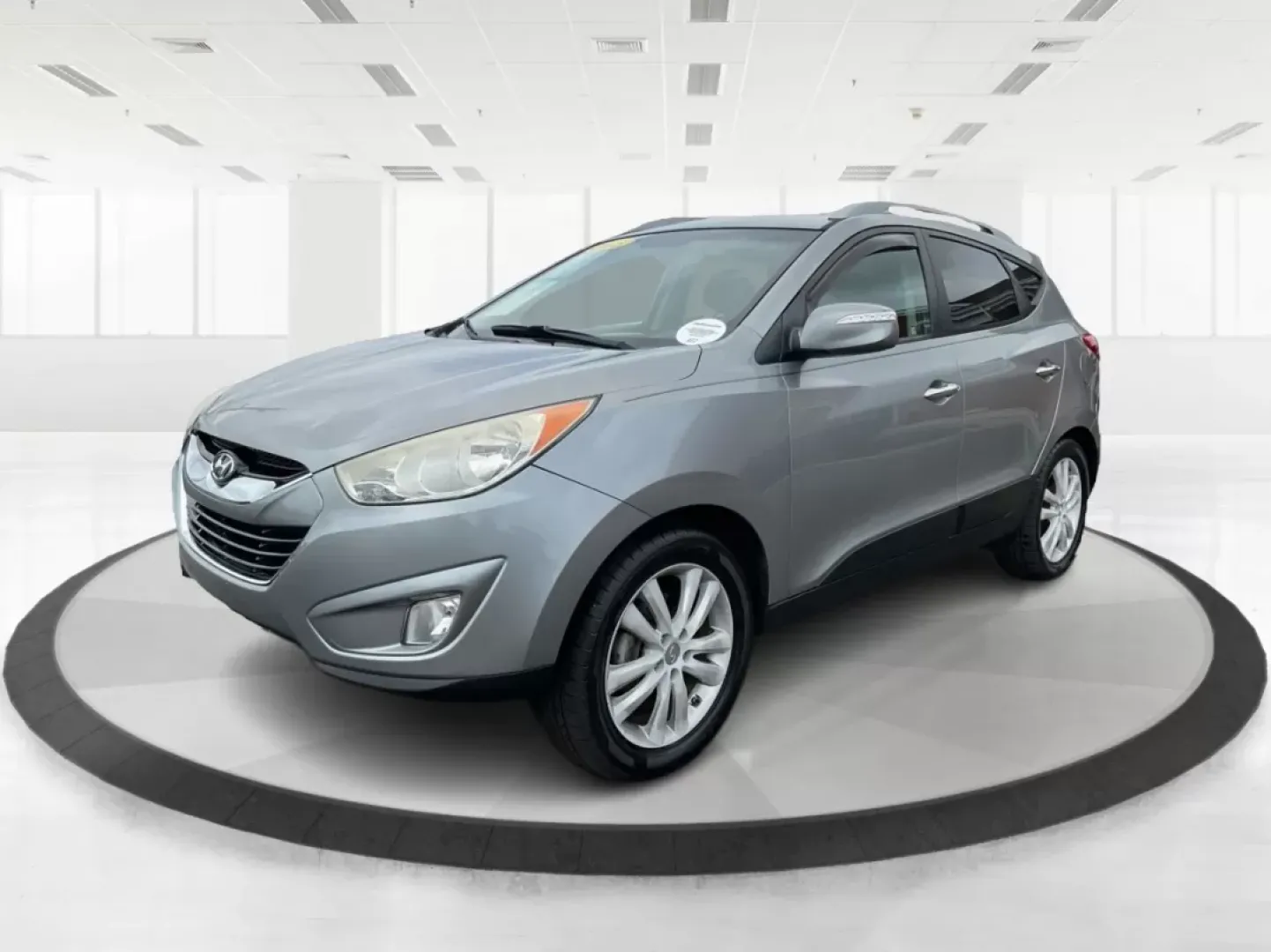 2013 Hyundai Tucson Limited (KM8JUCAC4DU) with an Other engine, located at 1230 East Main St, Xenia, OH, 45385, (937) 908-9800, 39.688026, -83.910172 - **Discover Your New Adventure Vehicle: 2013 Hyundai Tucson Limited at Advantage Car and Credit!** <br /> <br /> Are you searching for the perfect SUV that combines style, comfort, and versatility? Look no further than this striking 2013 Hyundai Tucson Limited, located right here at Advantage Car an - Photo#7