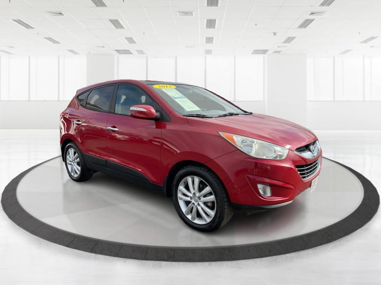 2013 Hyundai Tucson Limited (KM8JU3AC4DU) with an Theta II 2.4L I-4 DOHC engine, located at 1099 N County Rd 25A, Troy, OH, 45373, (937) 908-9800, 40.057079, -84.212883 - 2013 Hyundai Tucson Limited - Photo#0